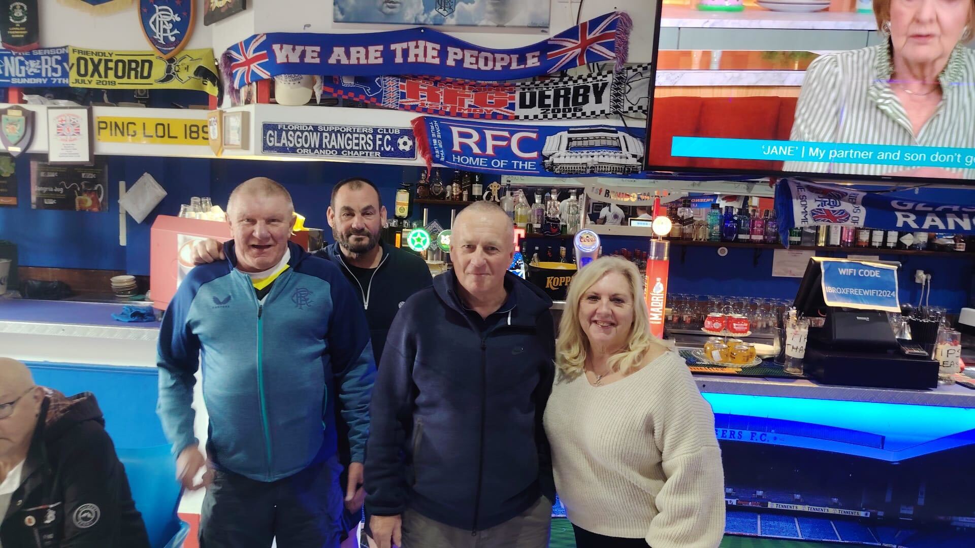 Ronnie Russell (second right) and Ibrox Bar owner Wilma Wallace during the Cheltenham Festival
