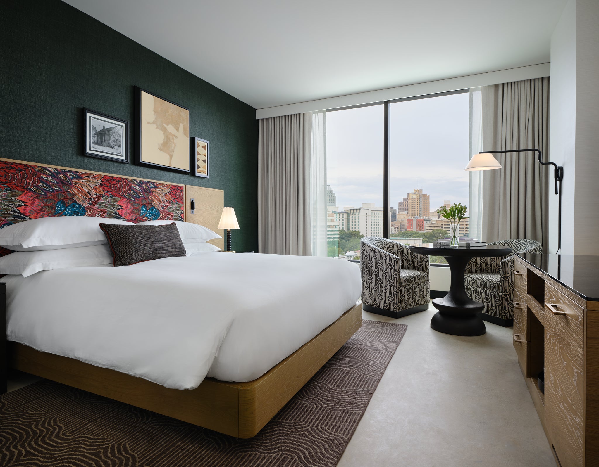 Bedrooms are sleek and spacious with gorgeous views of the skyline