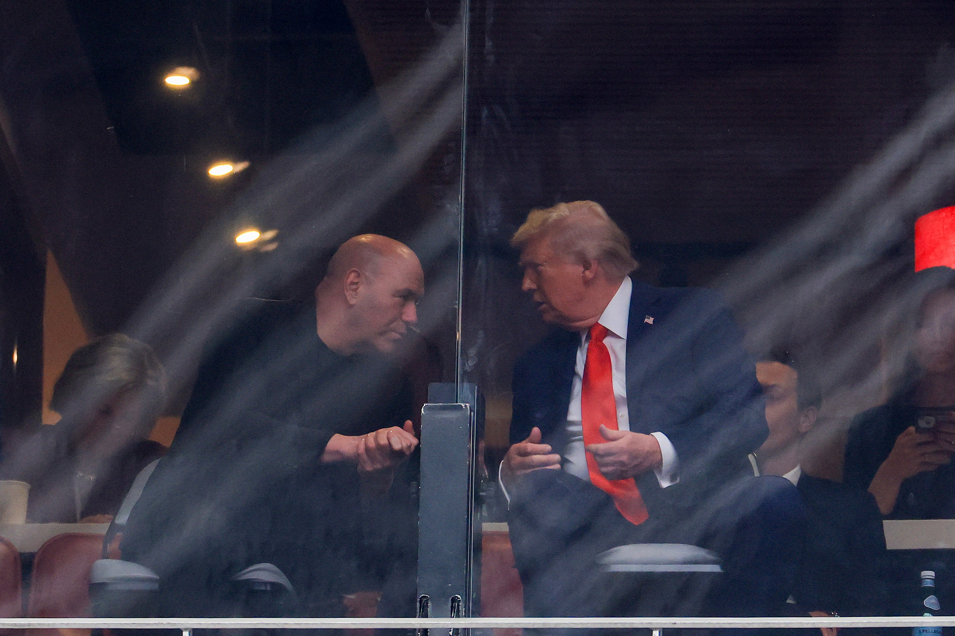 Trump said he plans to build a 100,000-seat stadium in DC for the June 14 fight. Here he is pictured with UFC CEO Dana White
