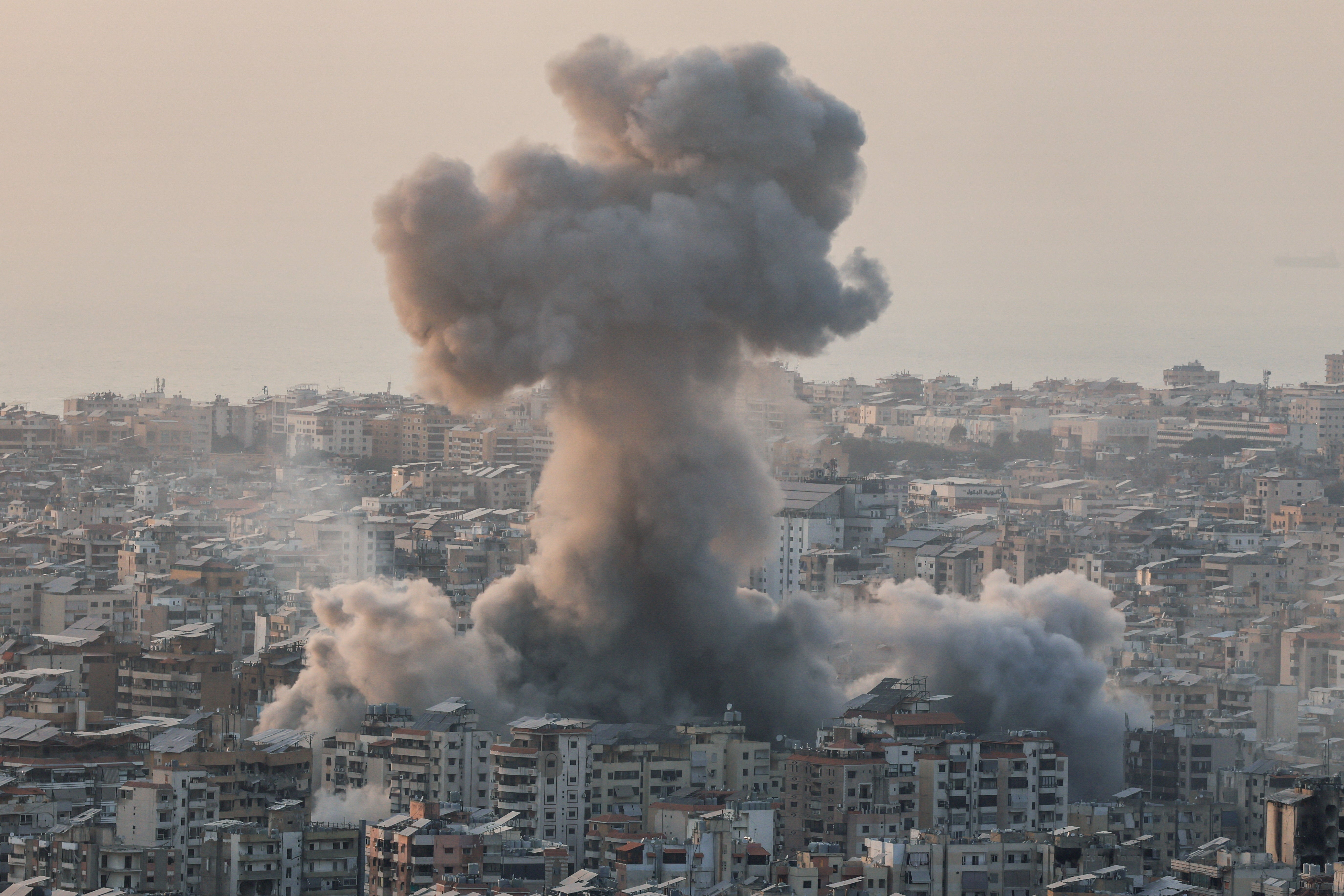 Israel threatens to take Lebanese territory as it ramps up Beirut bombing in escalating war