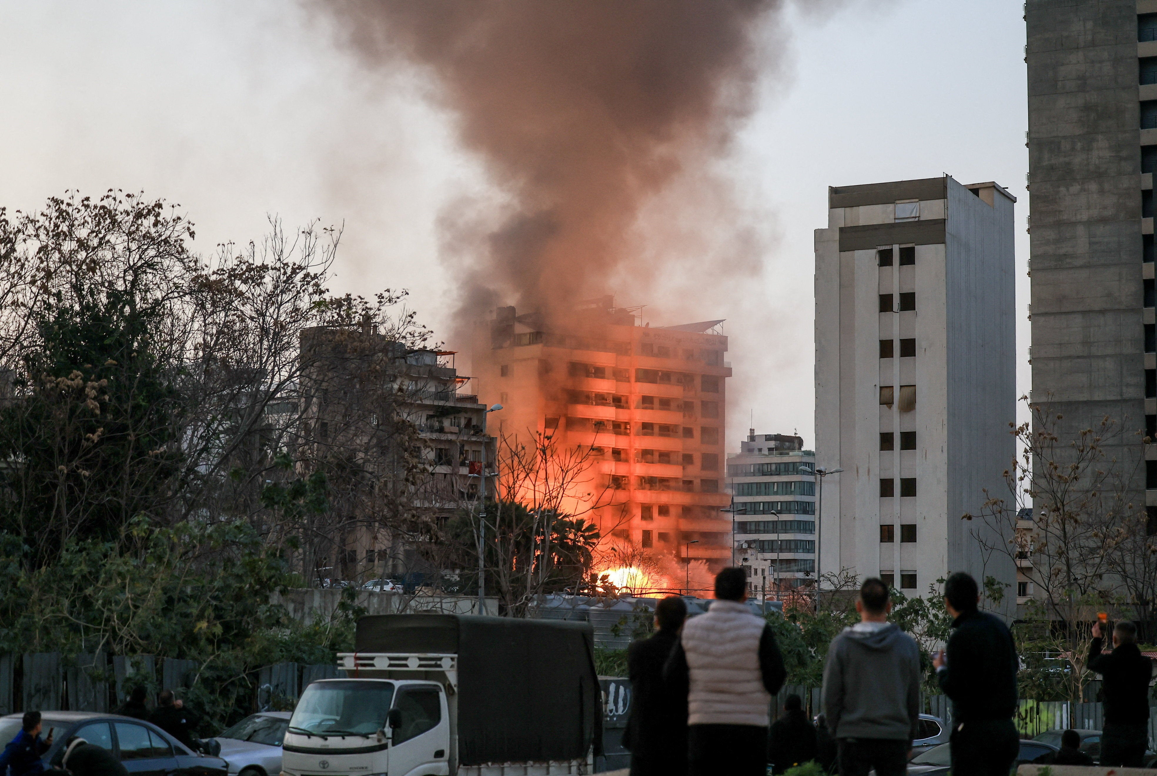 https://static.independent.co.uk/2026/03/12/15/17/Smoke-billows-after-an-Israeli-strike-on-Beiruts-southern-suburbs-aznb7qi2.jpeg?trim=7,0,9,0&width=1200&height=800&crop=1200:800