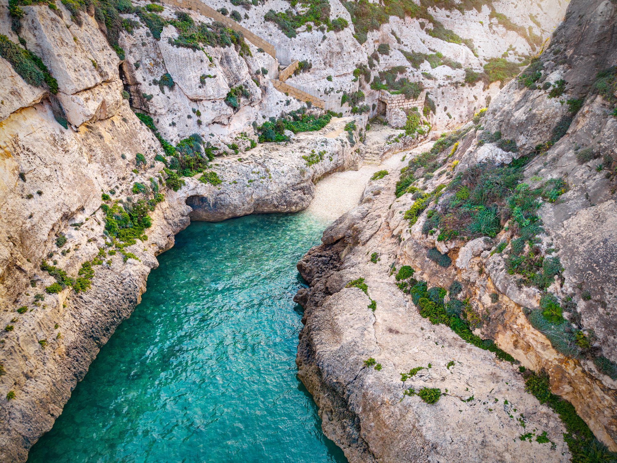 The incredible fjord-like cove of Wied il-Għasri on Gozo island