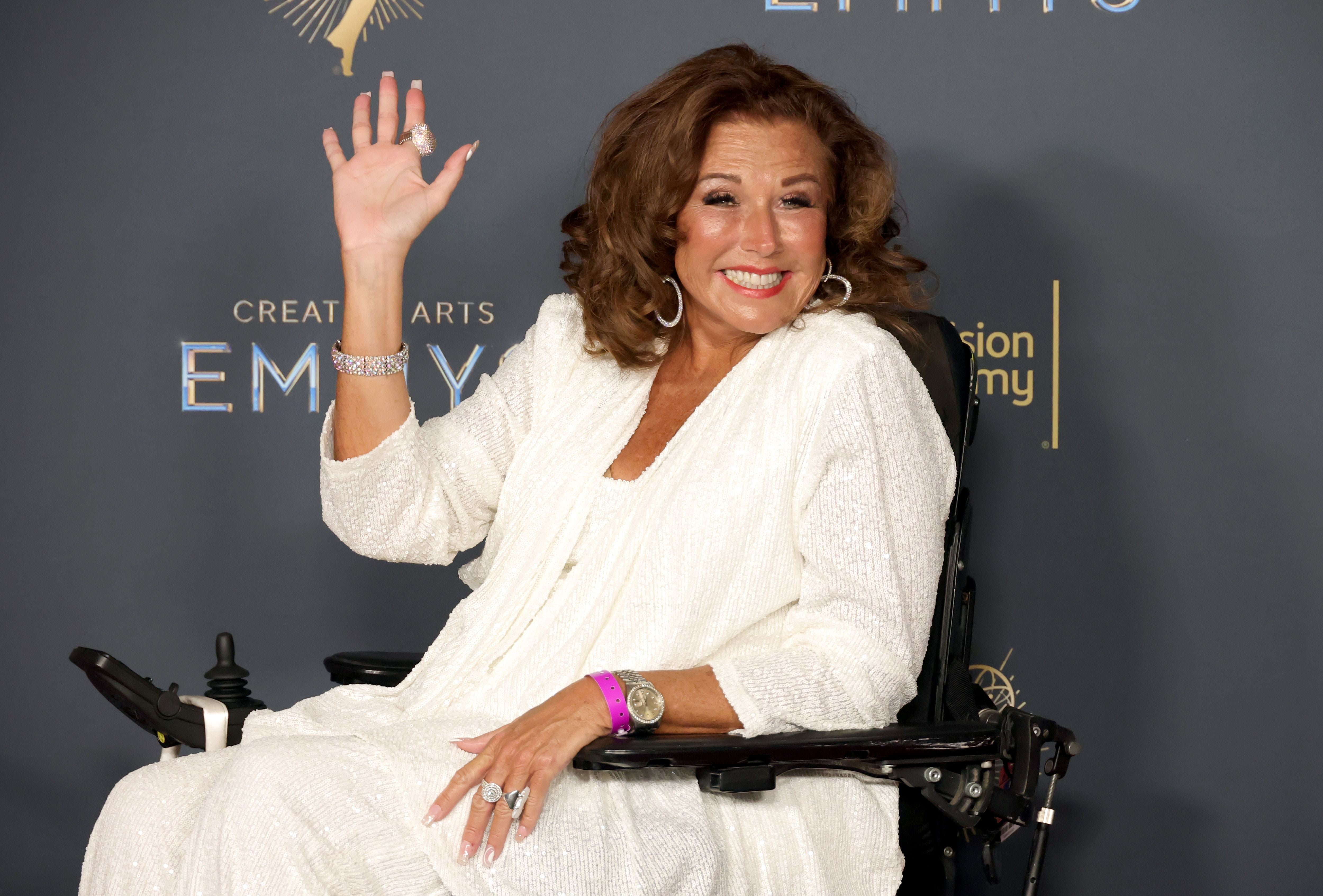 Abby Lee Miller made fun of herself after her wig accidentally fell off while riding the new Penguin Trek roller coaster at SeaWorld Orlando