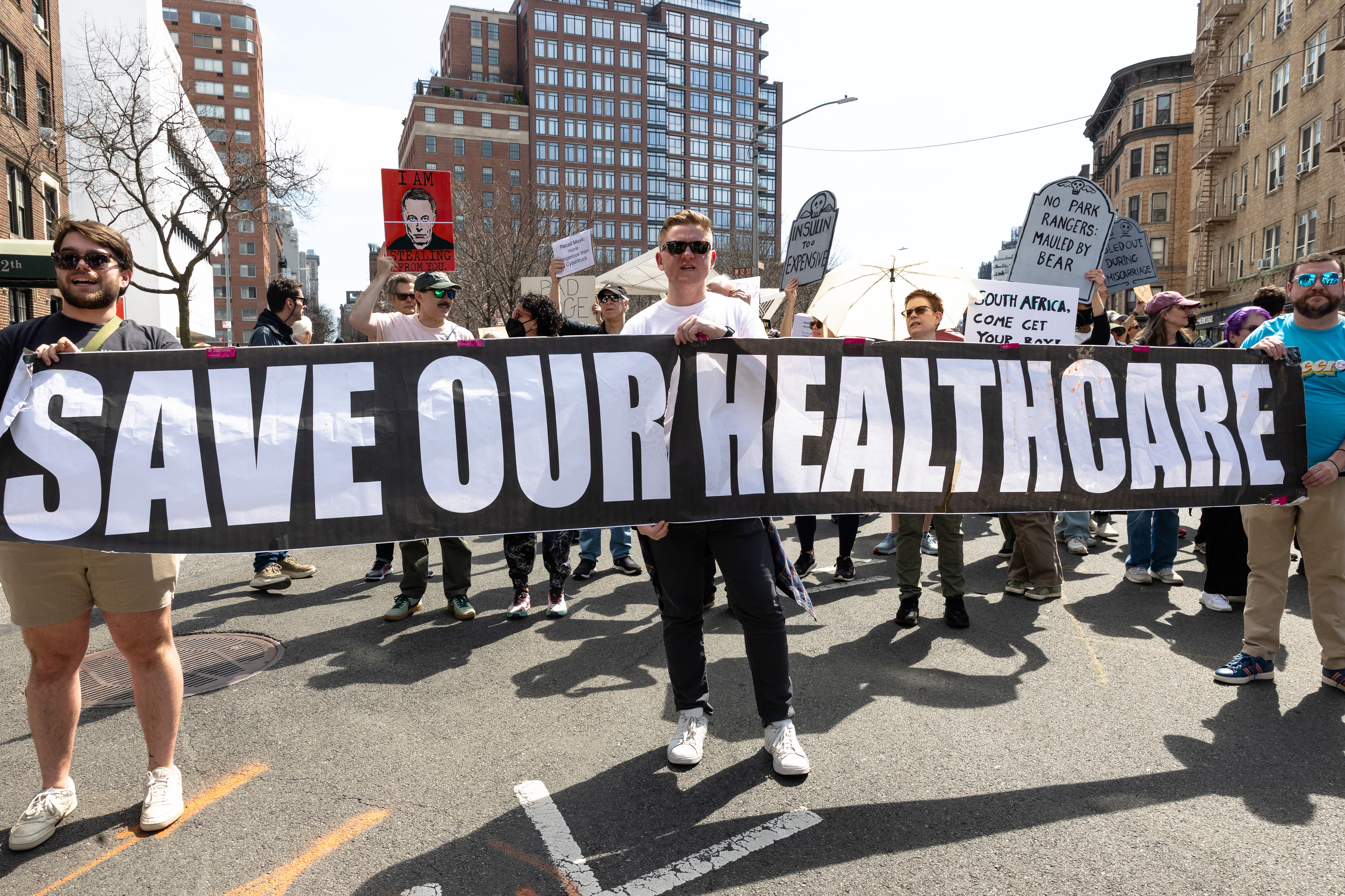 Americans are turning to rationing medicine and delaying retirement to cover healthcare costs, a new poll has found