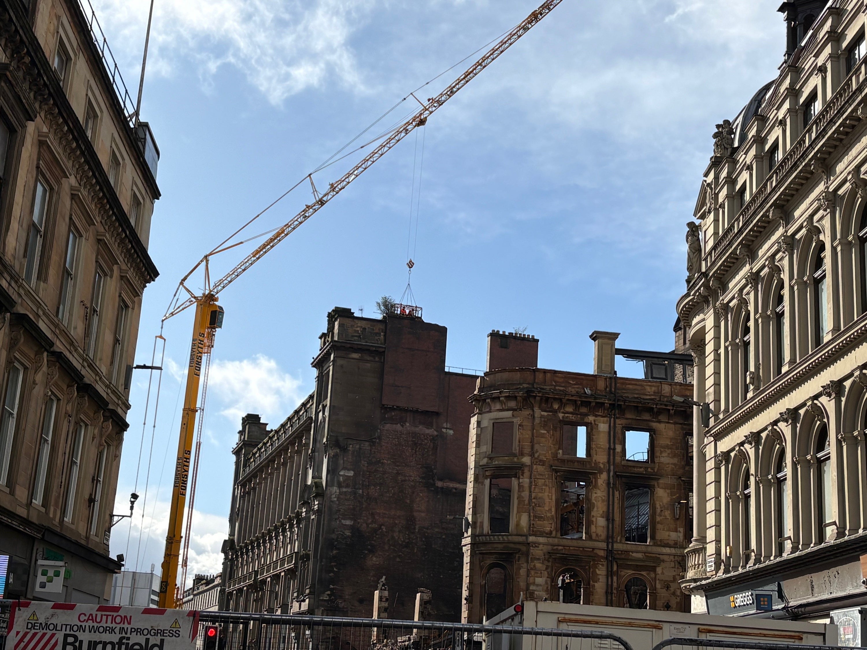 Demolition begins on historic building severely damaged by fire near ...