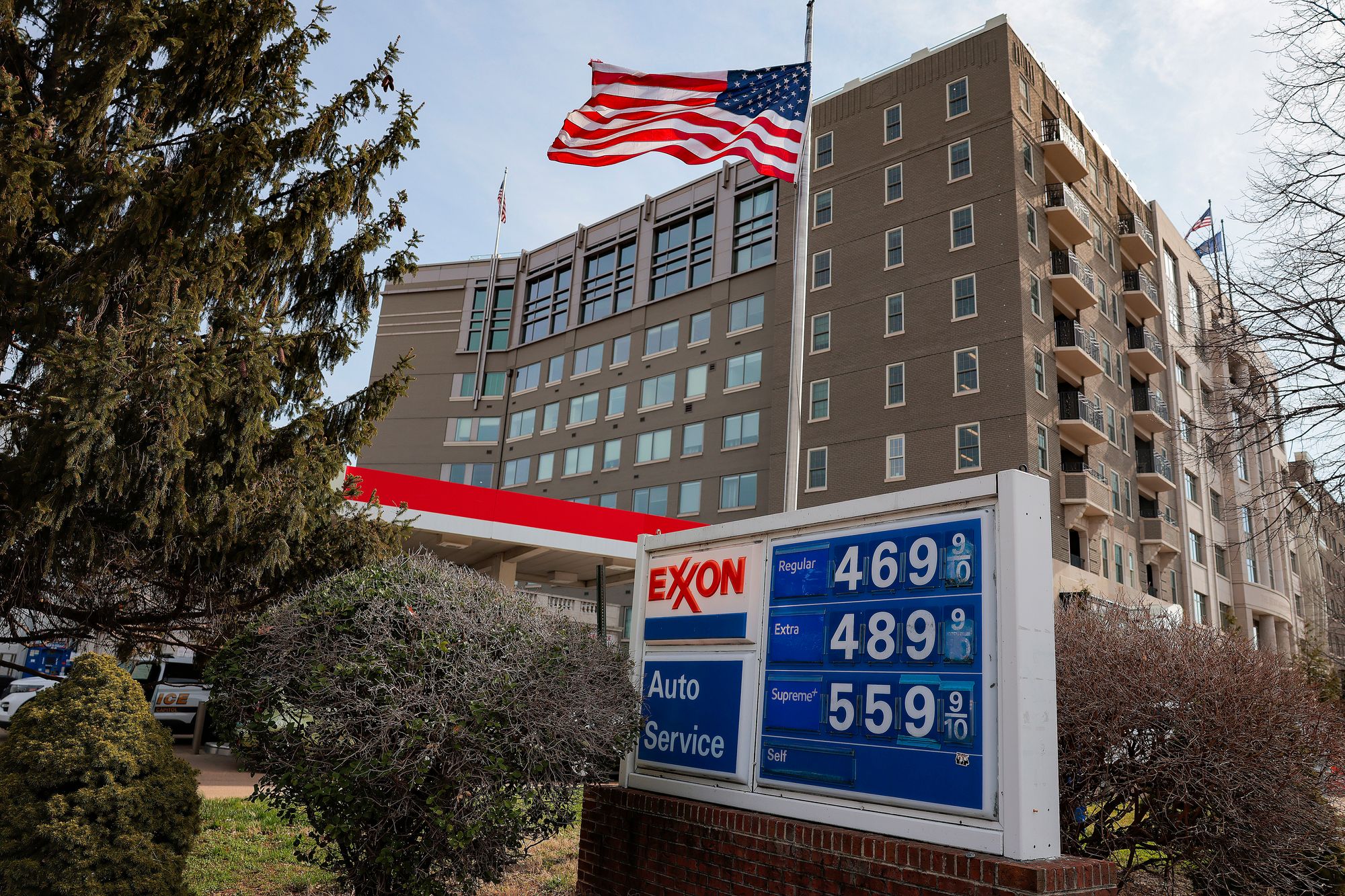 Gas prices are listed at an Exxon station in Washington, D.C. Trump’s war with Iran has caused the national average to spike by more than 70 cents per gallon.