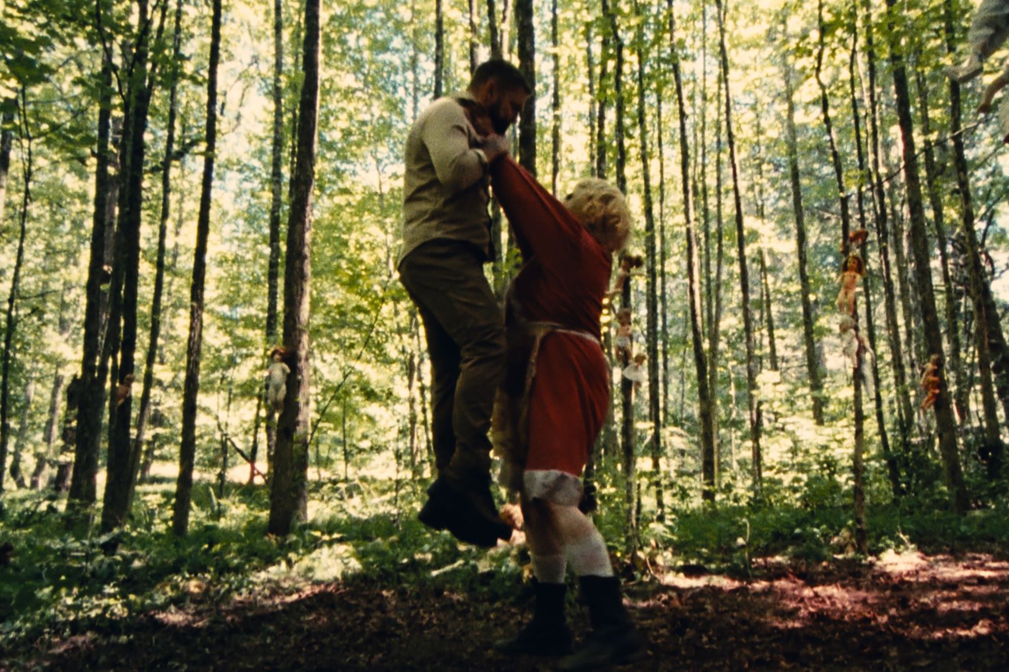 Up in the air: Scott is hoisted to probable doom in the new horror movie ‘Dolly’