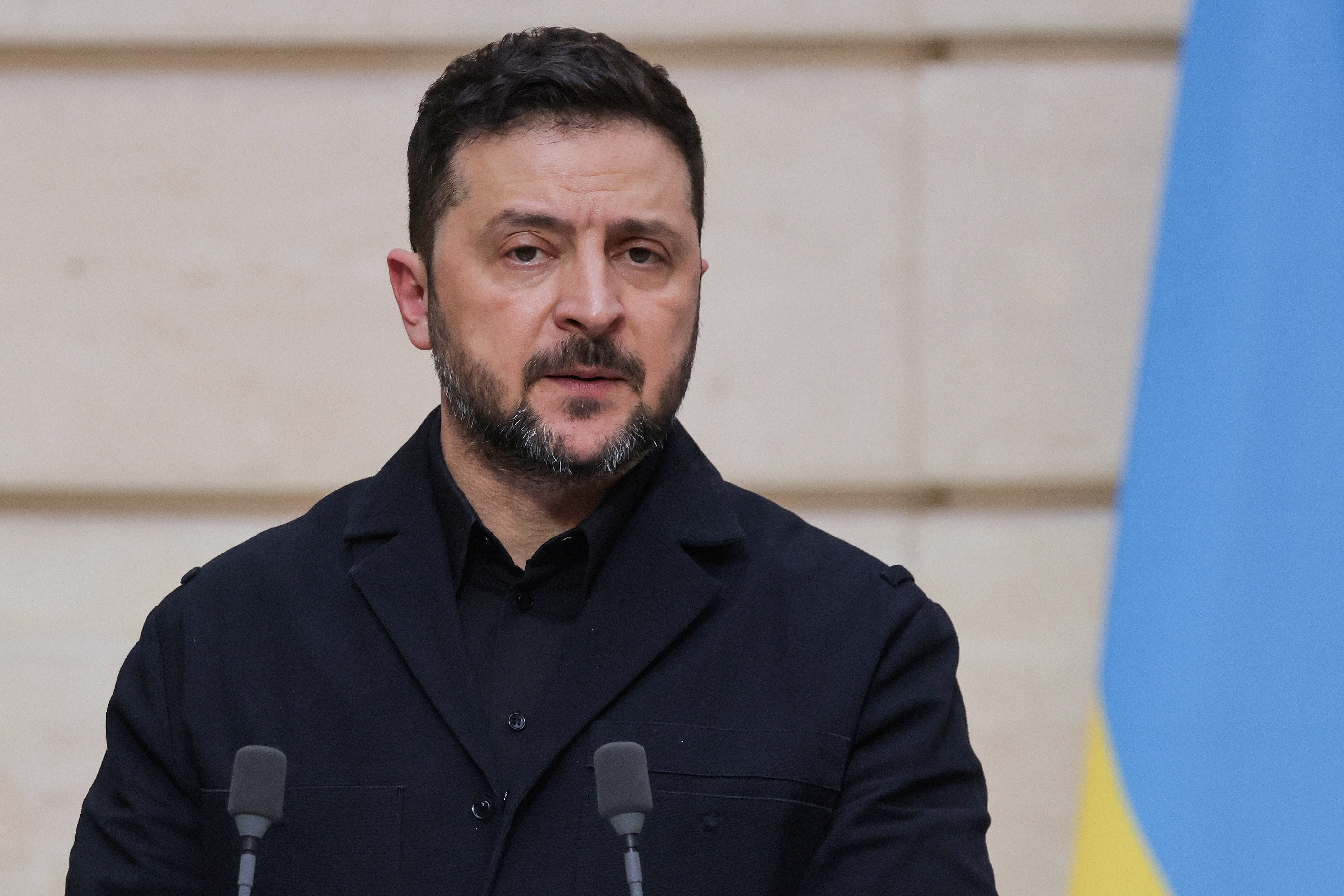 Volodymyr Zelensky speaks during a joint press conference with French president Emmanuel Macron following a bilateral meeting in Paris on 13 March
