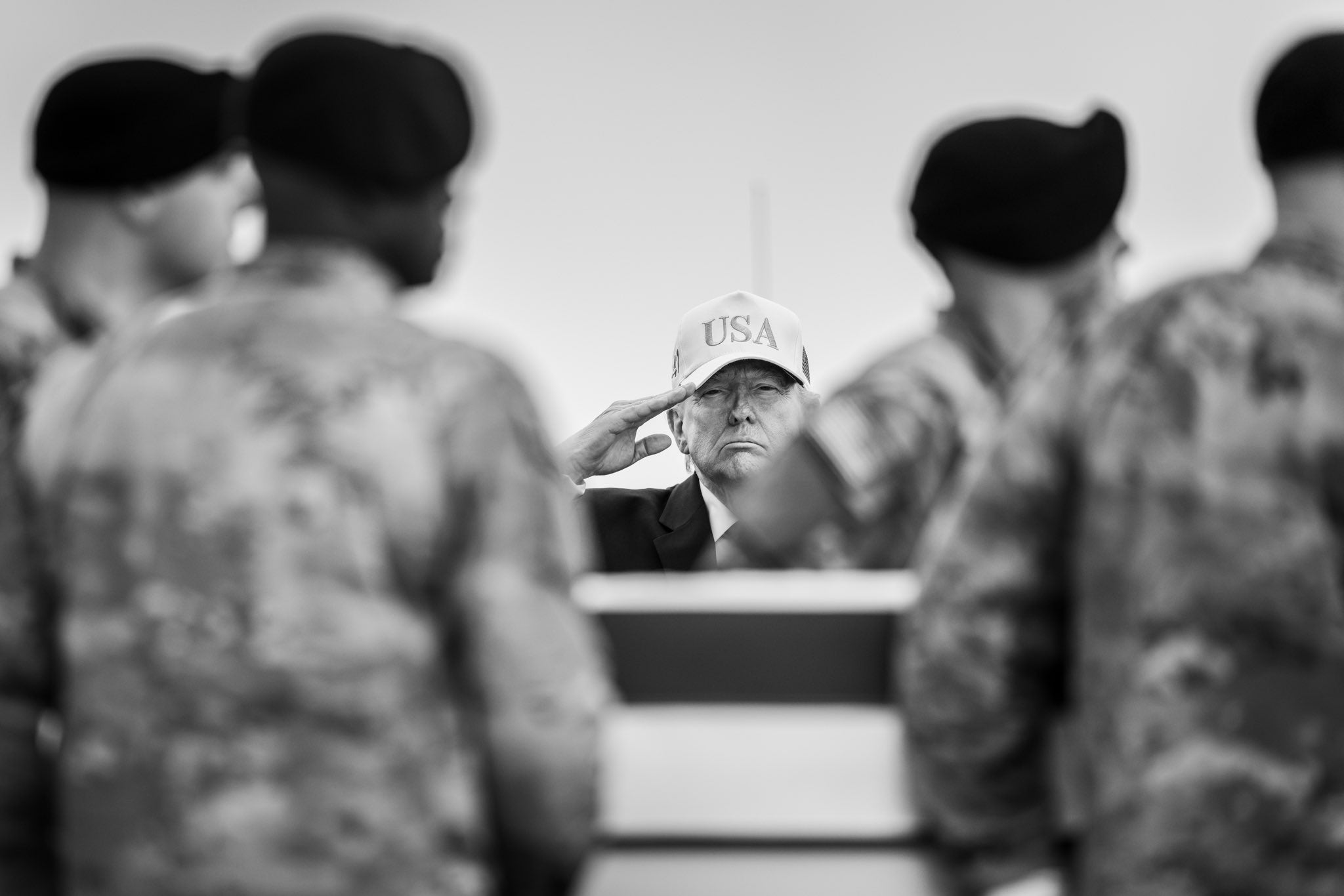 An officials White House photograph of Donald Trump saluting during a dignified transfer ceremony at Dover Air Force Base was used in a fundraising message from a Trump-connected PAC