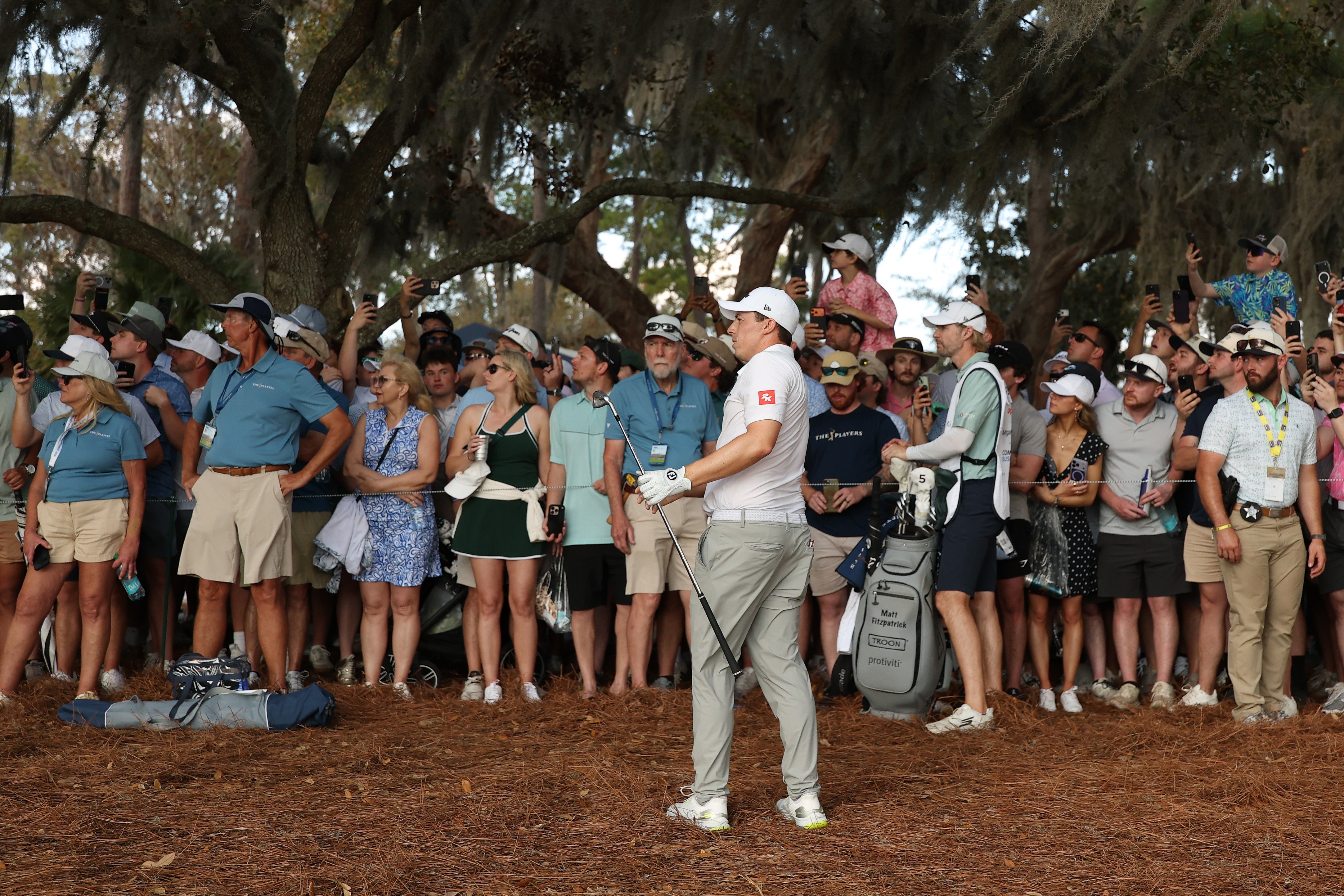 Fitzpatrick plays a shot on the 18th hole