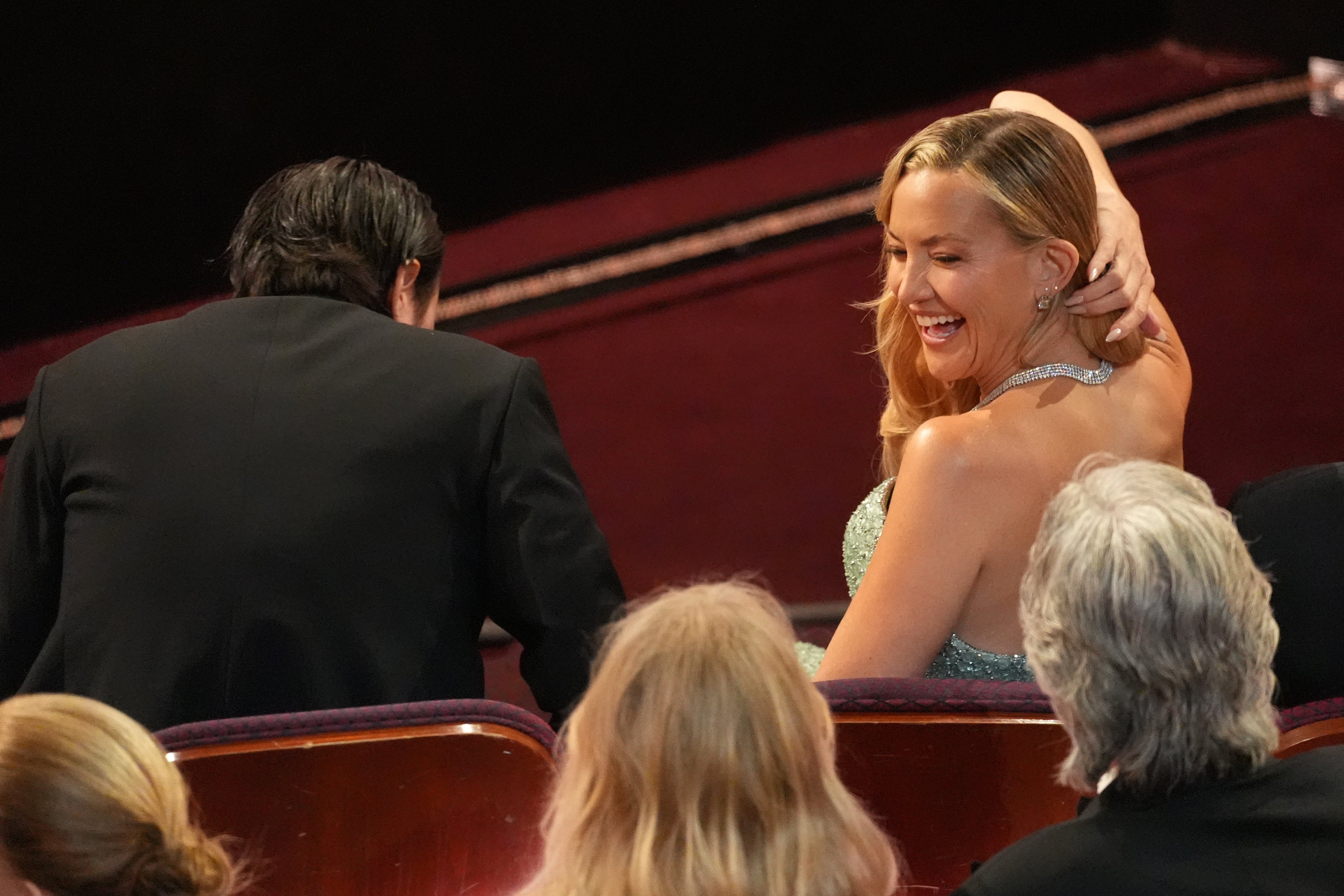 Danny Fujikawa, left, and Kate Hudson in the audience during the Oscars on Sunday, March 15, 2026, at the Dolby Theatre in Los Angeles. (AP Photo/Chris Pizzello)