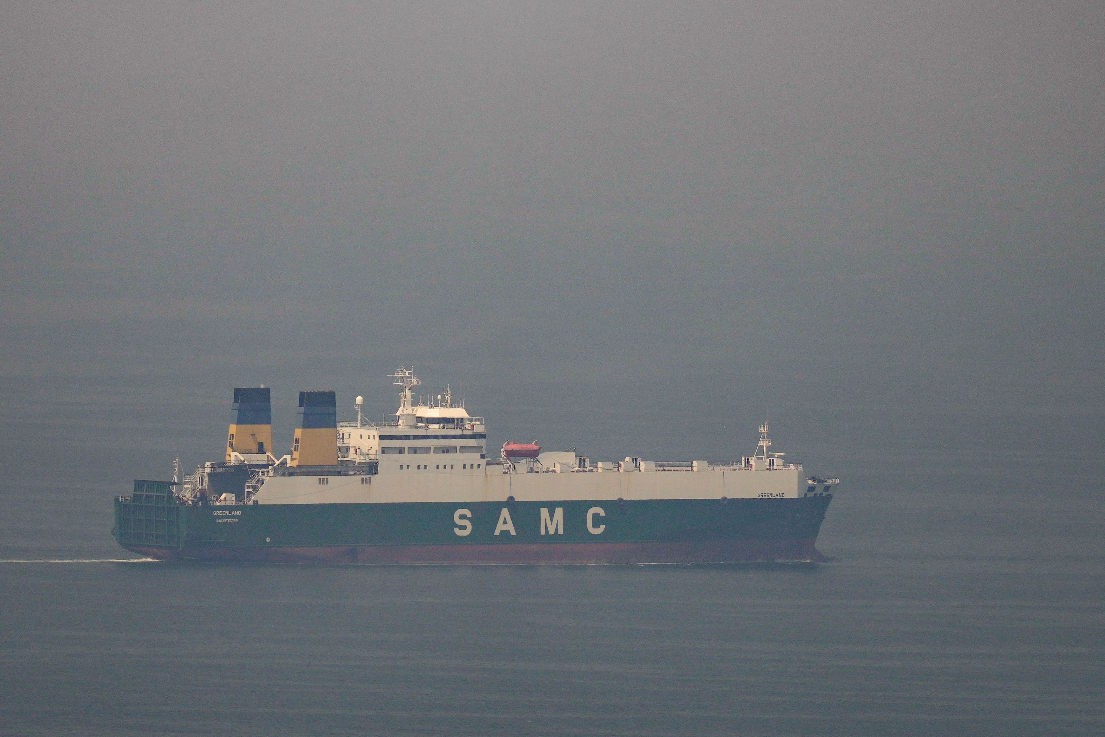A cargo ship sails towards the Strait of Hormuz