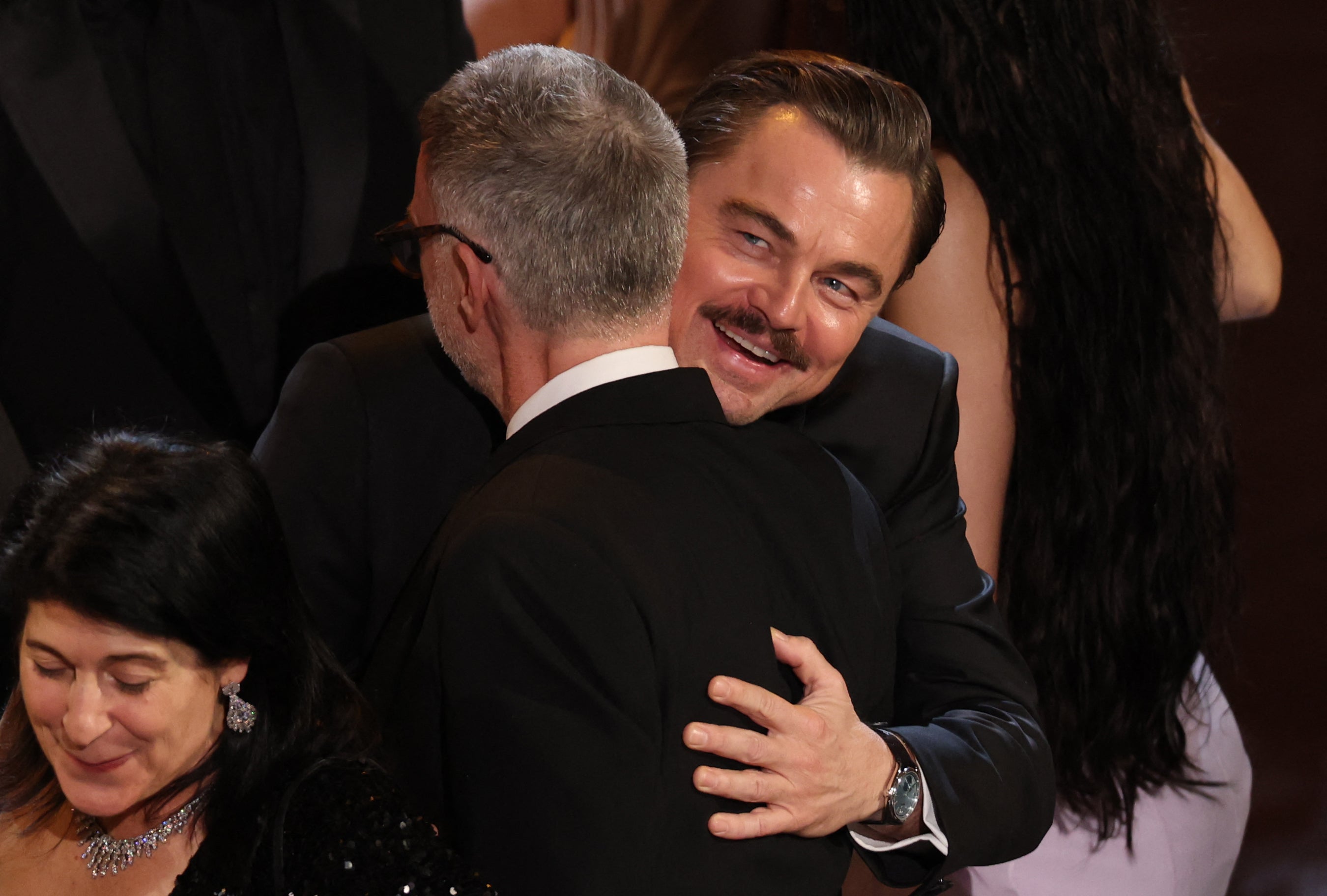 Leonardo DiCaprio embraces Paul Thomas Anderson as 'One Battle After Another' wins Best Picture at the 2026 Oscars
