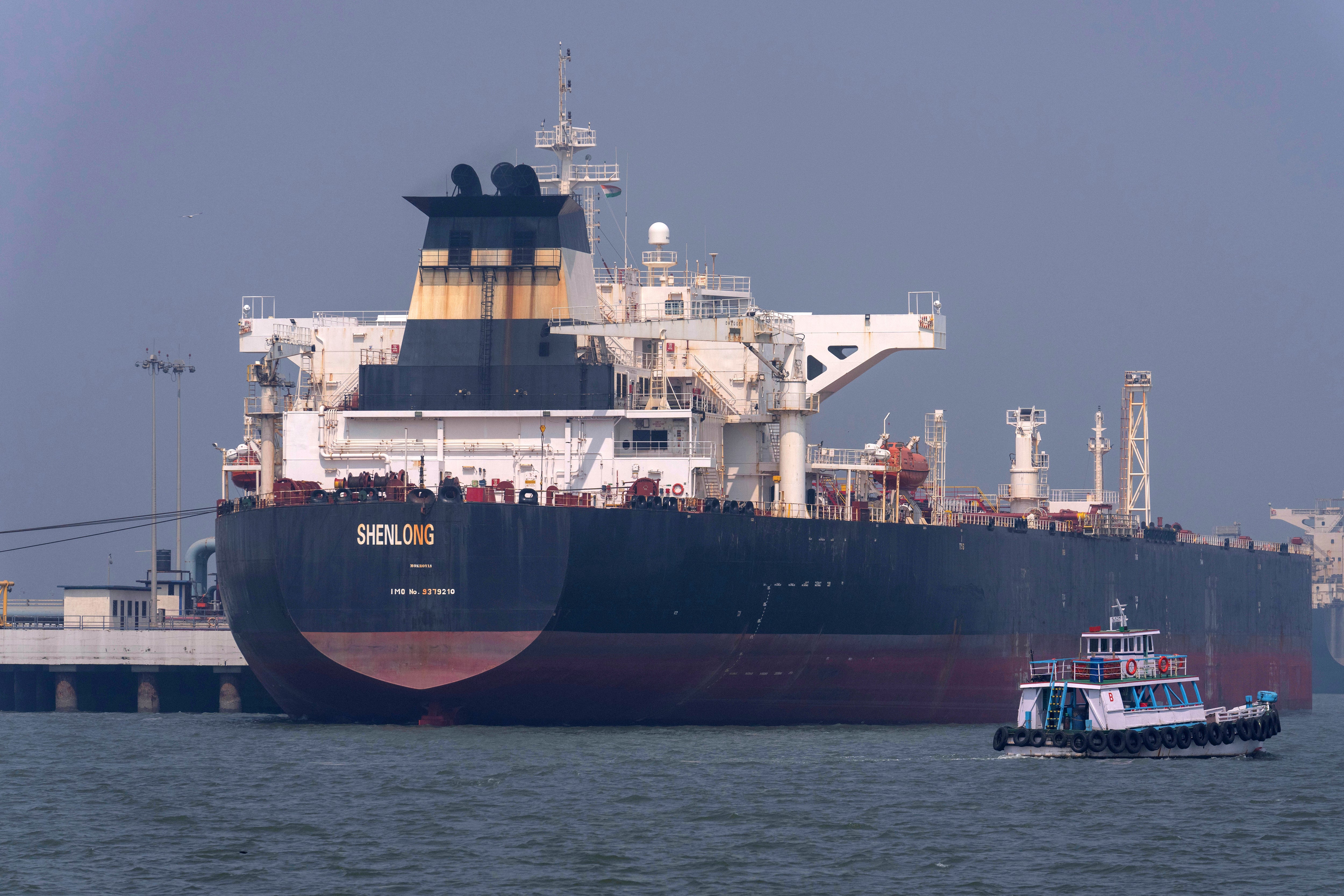File. Liberia-flagged tanker Shenlong Suezmax, carrying crude oil from Saudi Arabia, that arrived clearing the Strait of Hormuz, is seen at the Mumbai Port in Mumbai, India, Thursday, 12 March 2026