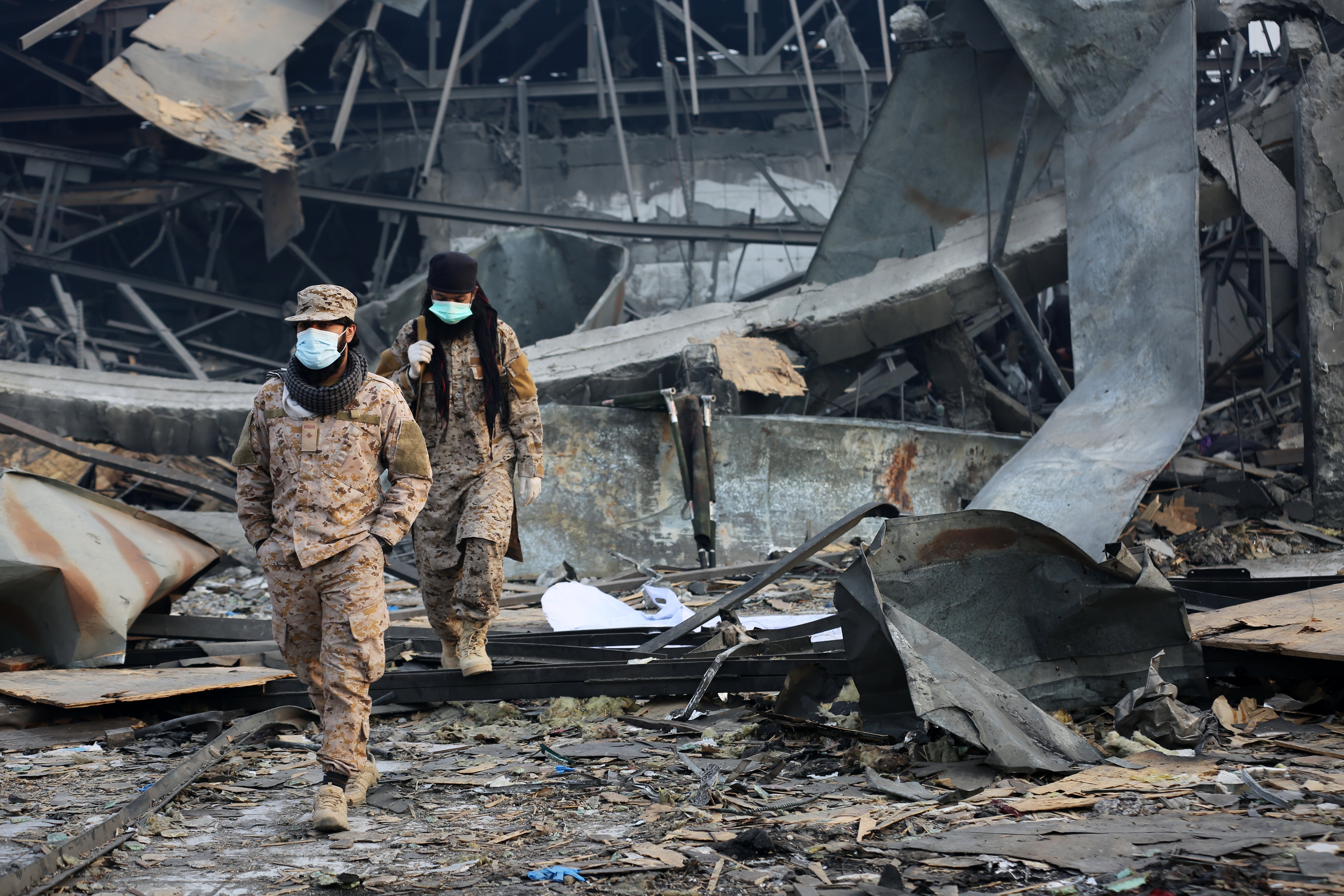 Taliban rescue workers inspect the site of a late-Monday airstrike at a drug rehabilitation hospital in Kabul, Afghanistan, Tuesday, March 17, 2026. (AP Photo/Siddiqullah Alizai)