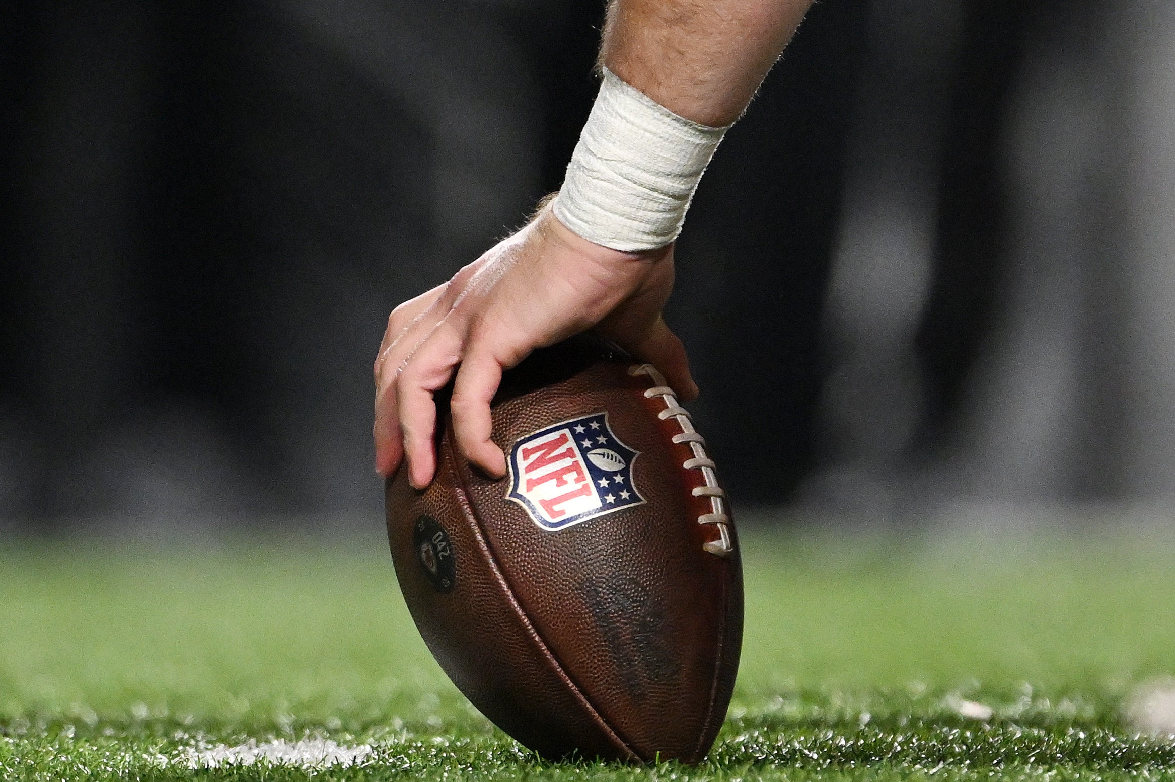 Scammer posed as &lsquo;well-known adult film star&rsquo; to defraud NFL and NBA players online from behind bars, feds say