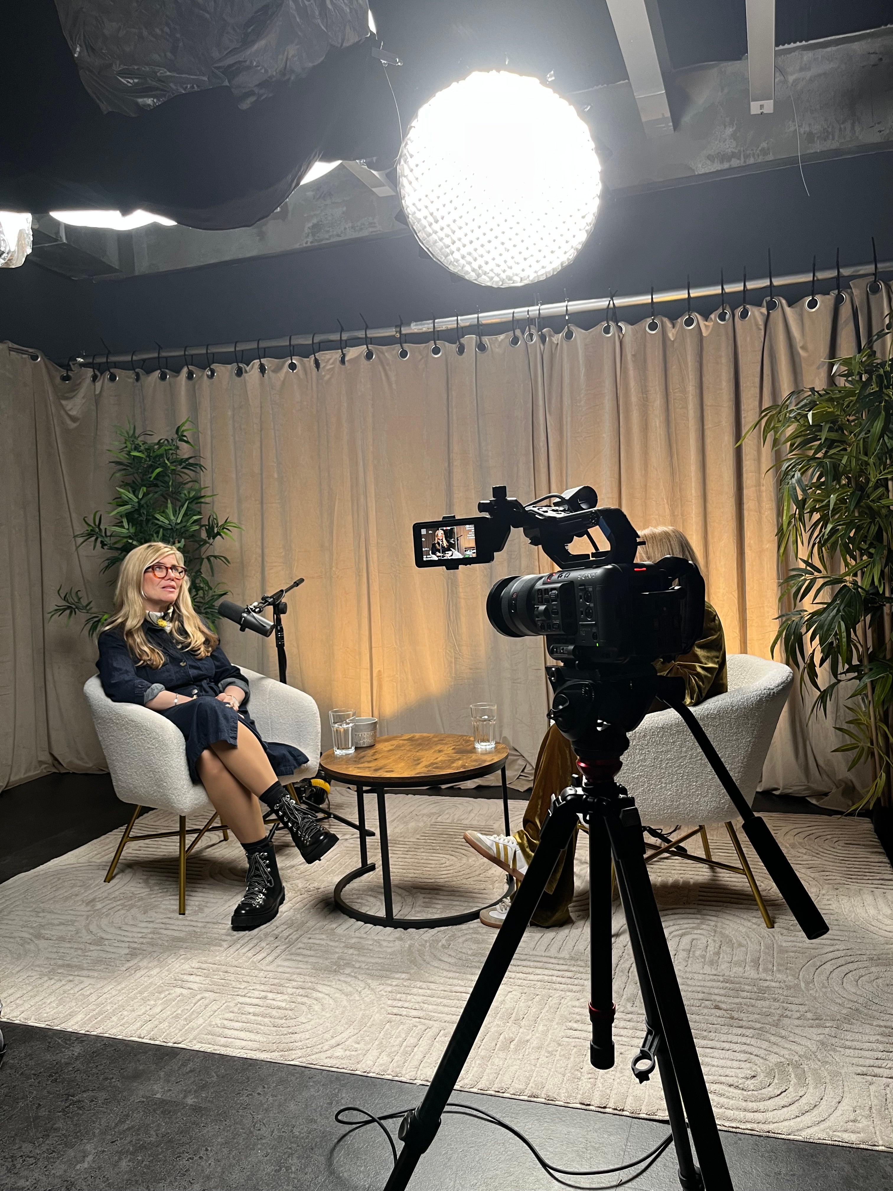 Emma Barnett recording her episode of the the Well Enough podcast