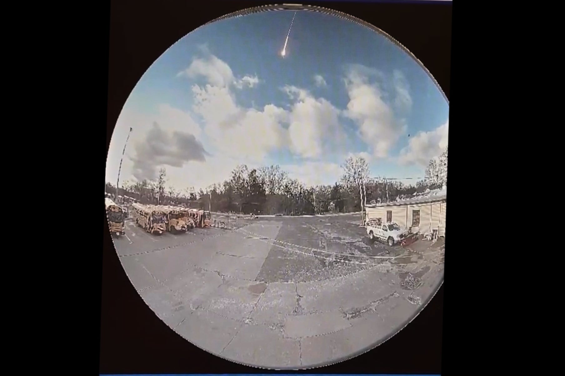 Video taken from a surveillance camera shows the suspected meteor falling through the sky in Olmsted Falls, Ohio