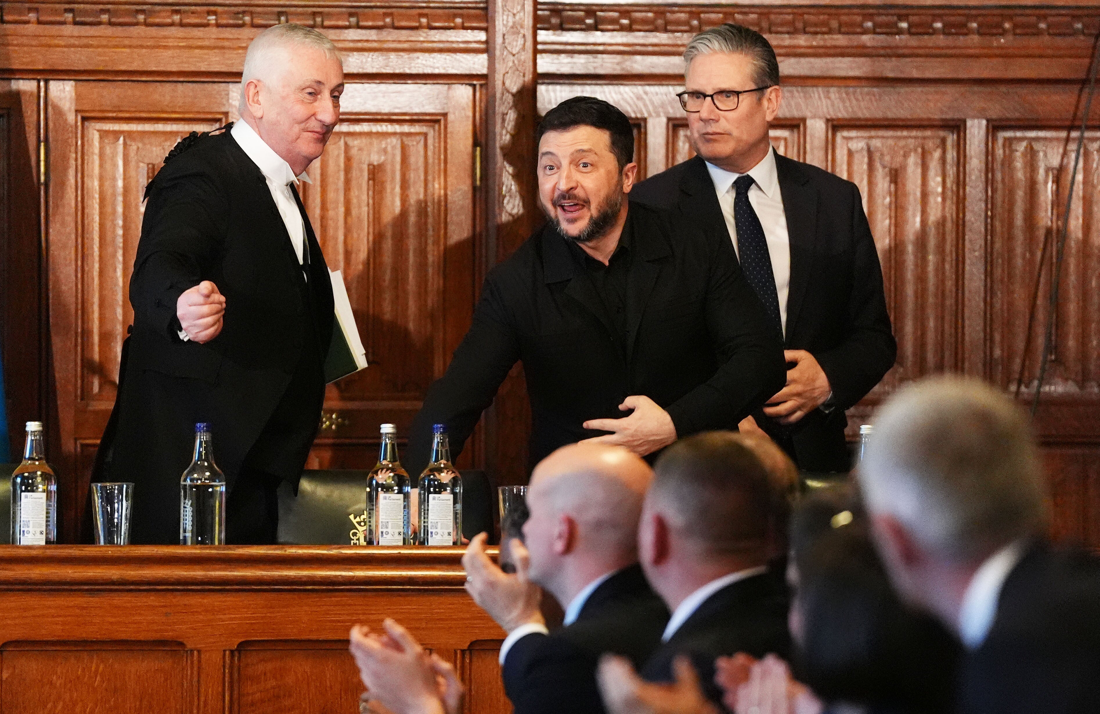 Commons Speaker Sir Lindsay Hoyle, Volodymyr Zelensky and prime minister Sir Keir Starmer following President Zelensky’s speech to MPs and peers in Committee Room 14 at the House of Commons, central London