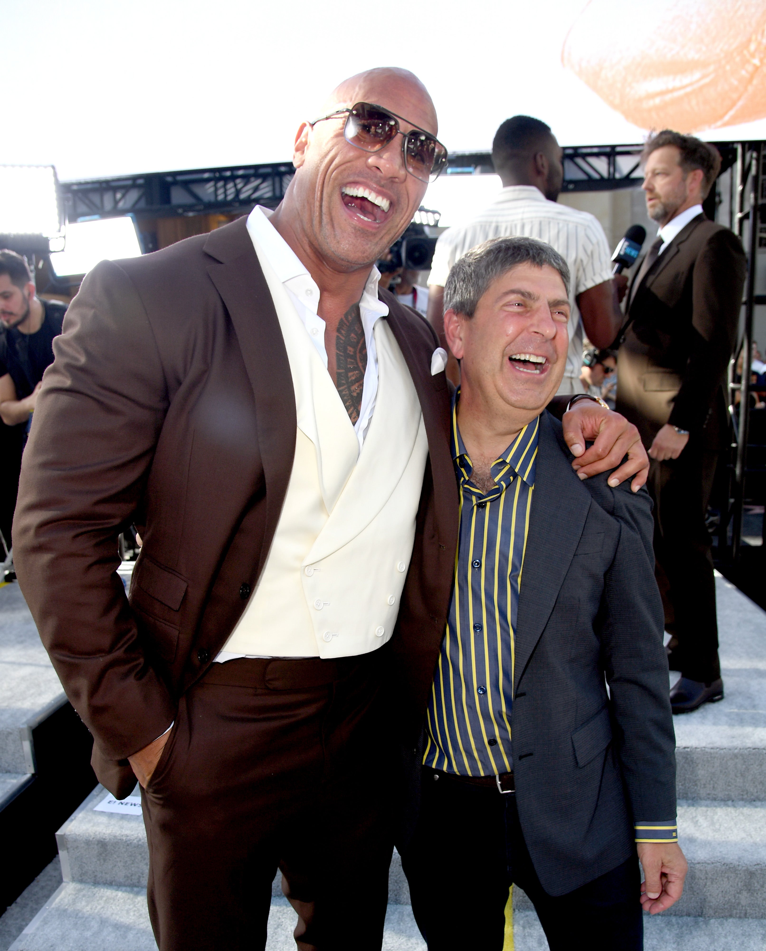 Shell, seen here in 2019 with Dwayne 'The Rock' Johnson, was the chairman of NBCUniversal Film and Entertainment until he was fired over sexual harassment claims. He is now accusing a high-stakes gambler and film producer of an extortion plot, which the accused flatly denies