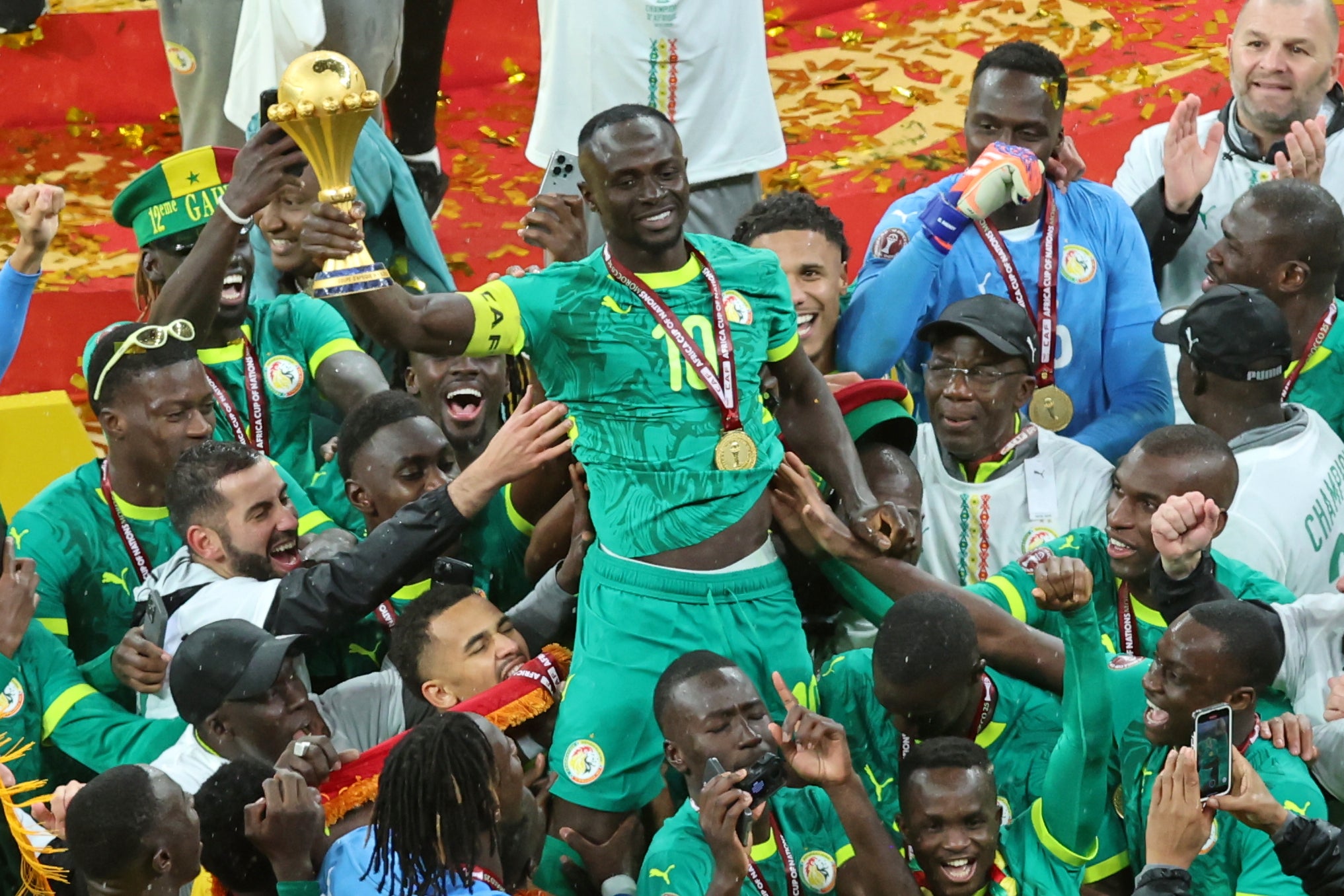 Senegal’s Sadio Mane lifts the Africa Cup of Nations - a trophy that will now be awarded to Morocco