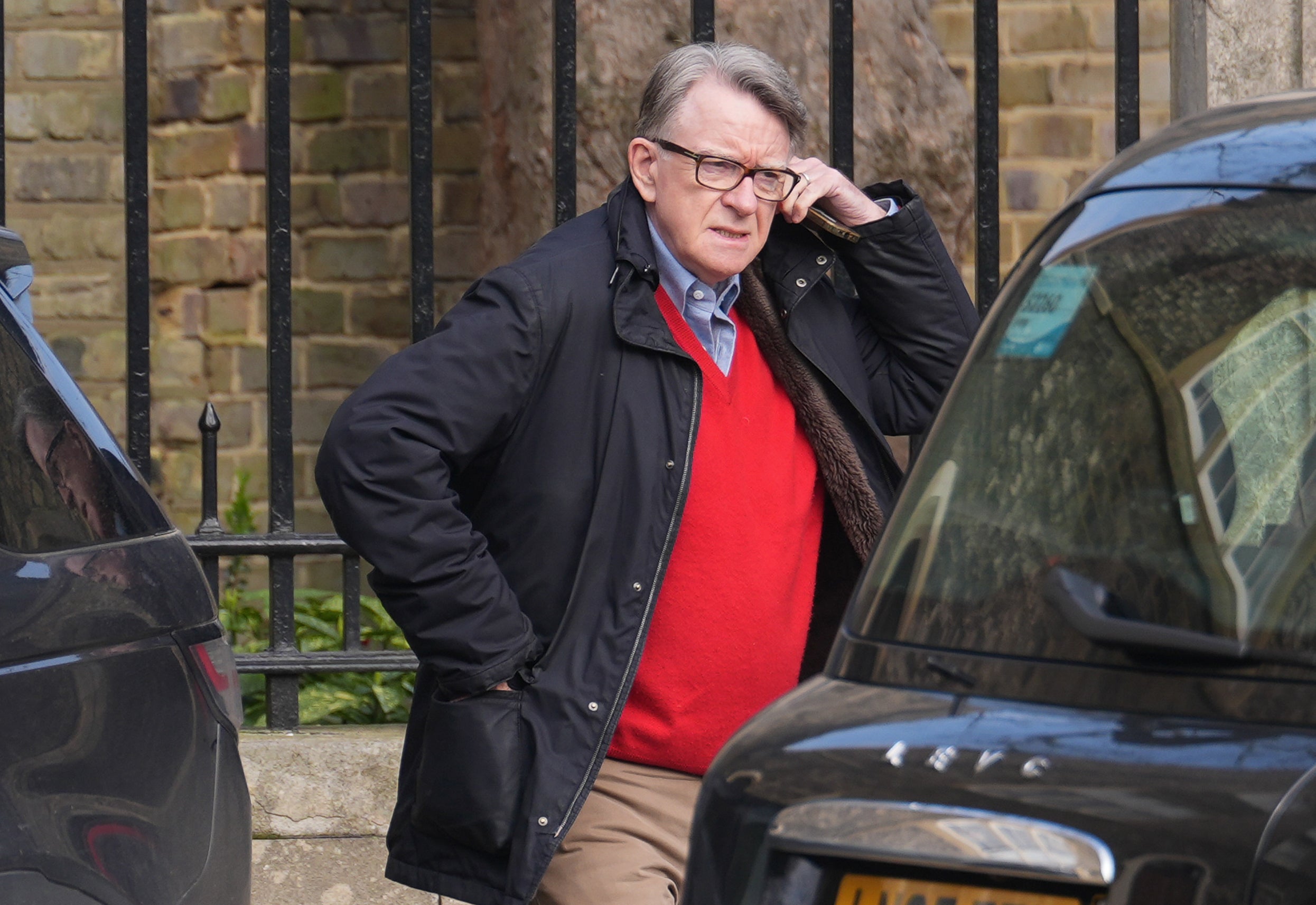 Lord Peter Mandelson outside his London home following his arrest on suspicion of misconduct in public office
