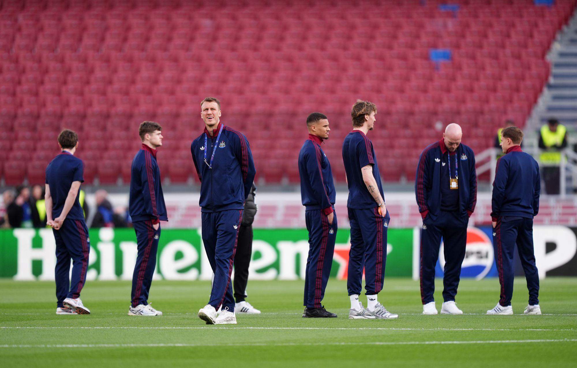Newcastle players take in the sights of an empty Camp Nou.