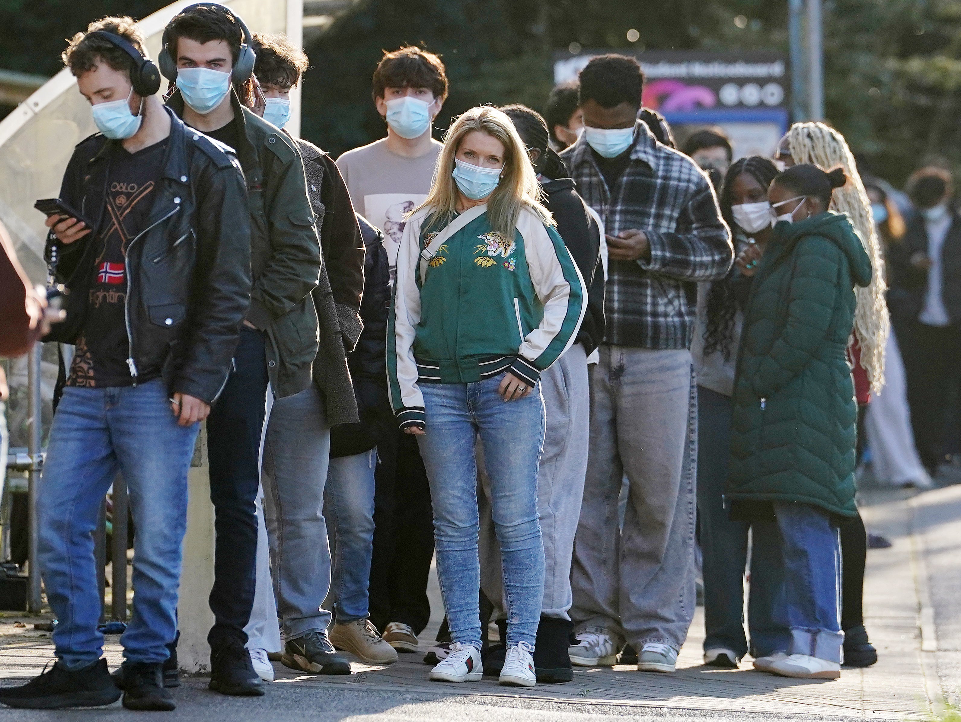 Students wait in line for a meningitis B vaccine (PA)