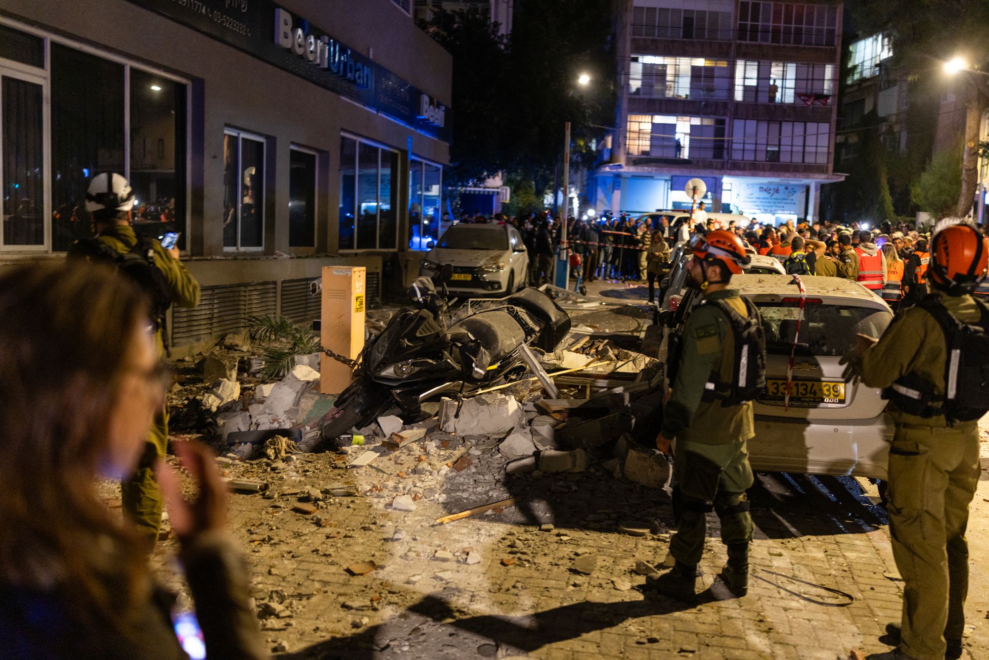 Iran war briefing: Tel Aviv bombarded in retaliation for killing security chief