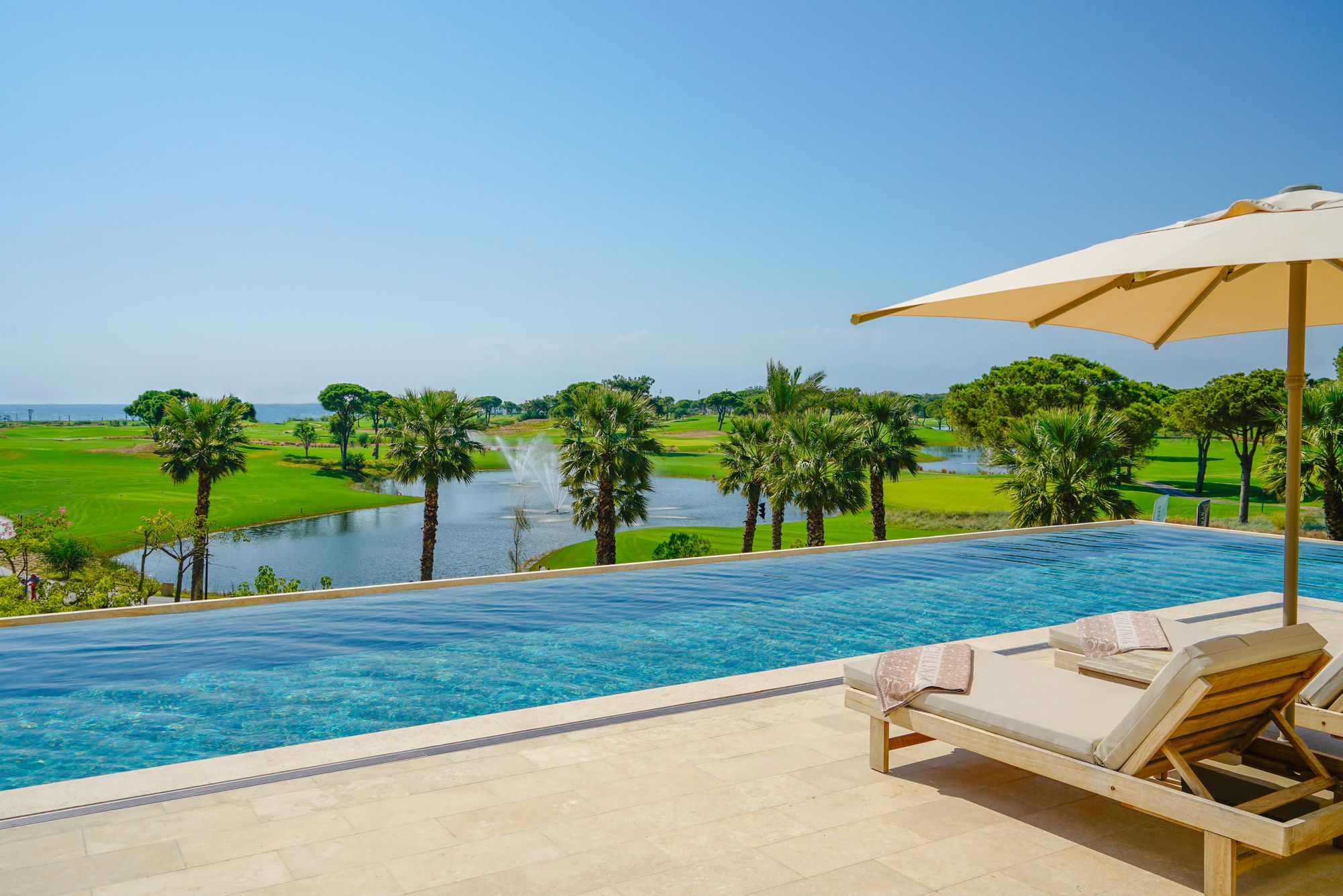 Enjoy views of the lush golf course poolside when you’re not playing a round