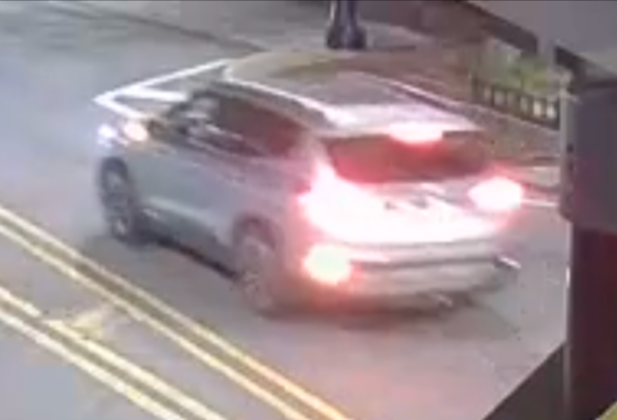The unidentified suspect fled in a silver SUV which was also caught on camera