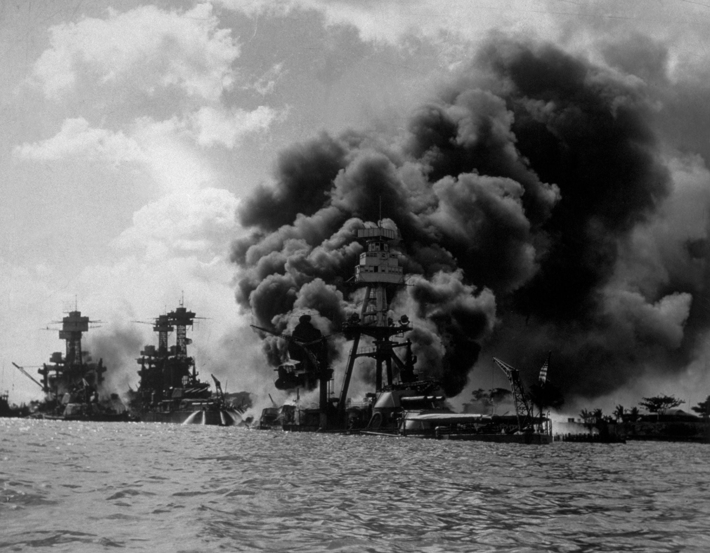 U.S.S. Arizona is shown burning in this photograph taken just after the Japanese attack on Pearl Harbor