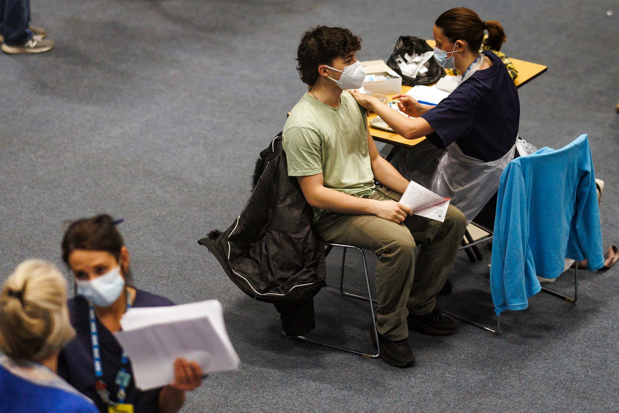 A student receives the Meningitis B vaccine at the University of Kent sports hall on March 19, 2026 in Canterbury, England.
