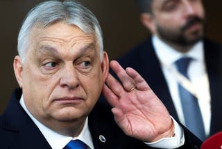 Hungarian prime minister Viktor Orban gestures as he speaks to the press upon his arrival for a European Union leaders' summit in Brussels