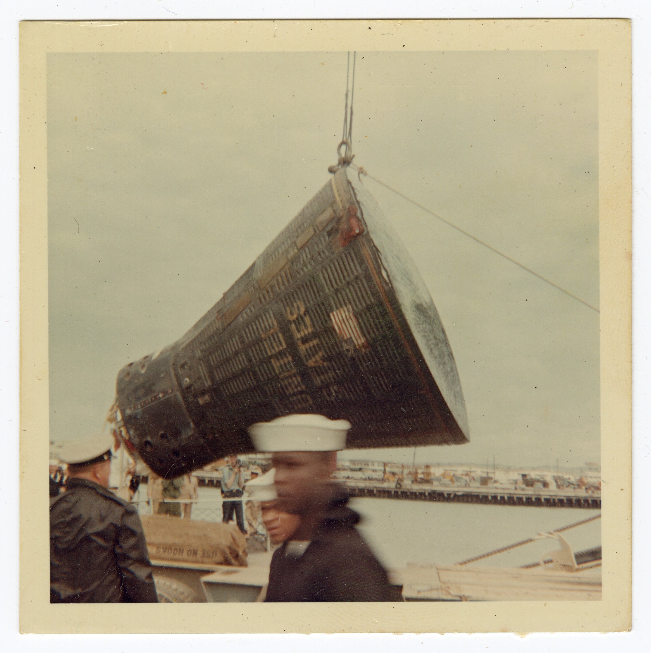 The Gemini 8 spacecraft lifted for transport at Naha Air Base in Okinawa, Japan in 1966