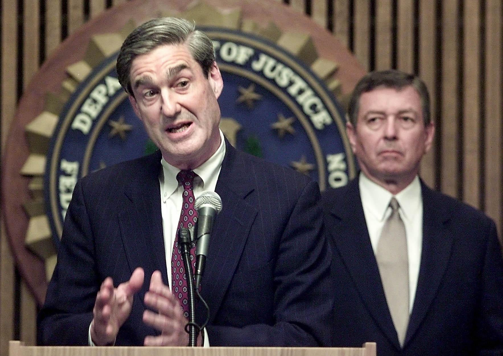 Mueller (left) addressing the nation on September 12, 2001, one day after the terrorists attacks that forever changed the United States