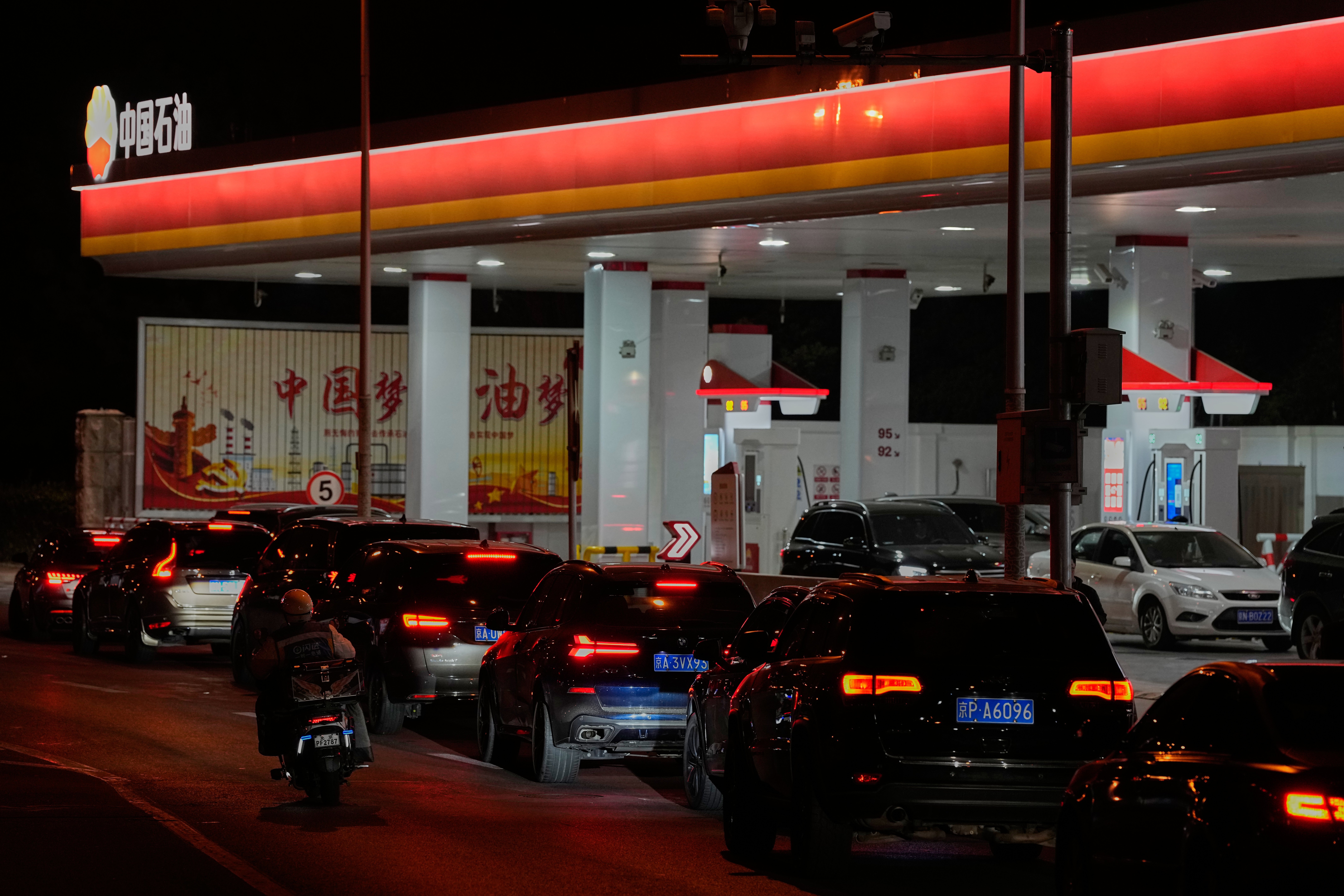 China limits fuel price hike amid surging oil costs