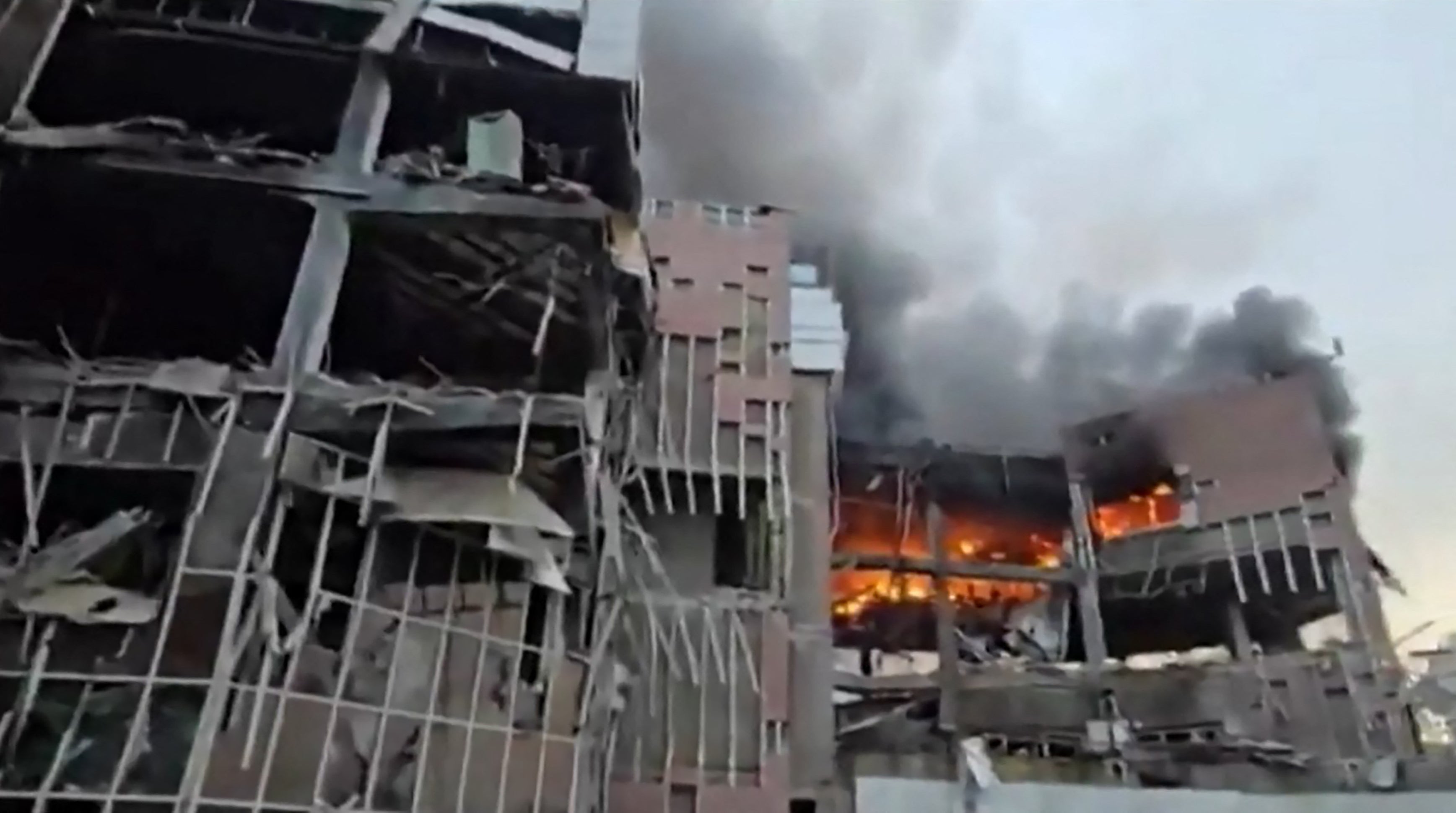 A screengrab of a social media video on 23 March 2026 shows destruction and fire at the Iranian government’s electronics industries building in Tehran following a strike