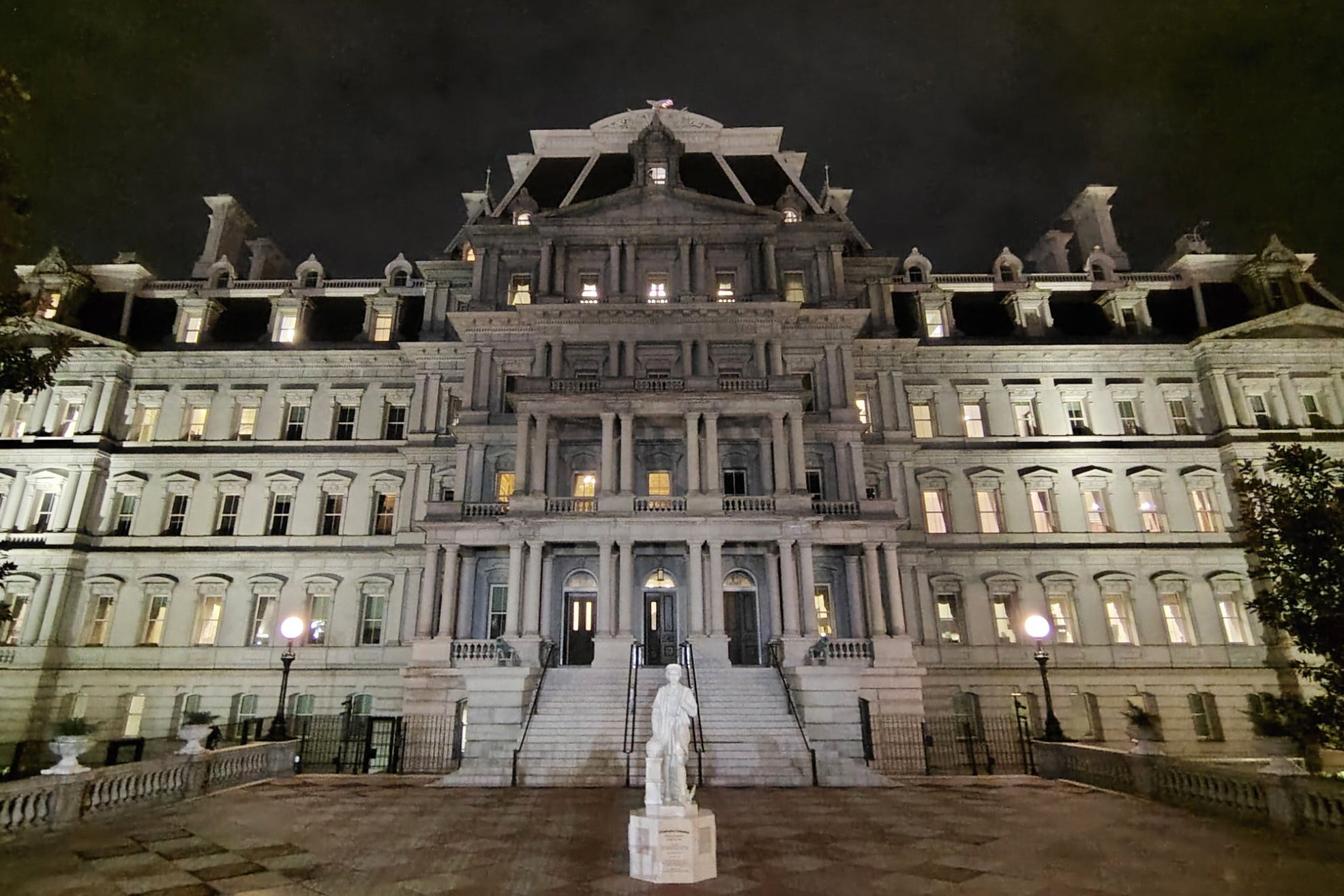 The statue of Christopher Columbus standing in front of the Eisenhower Executive Office Building in Washington