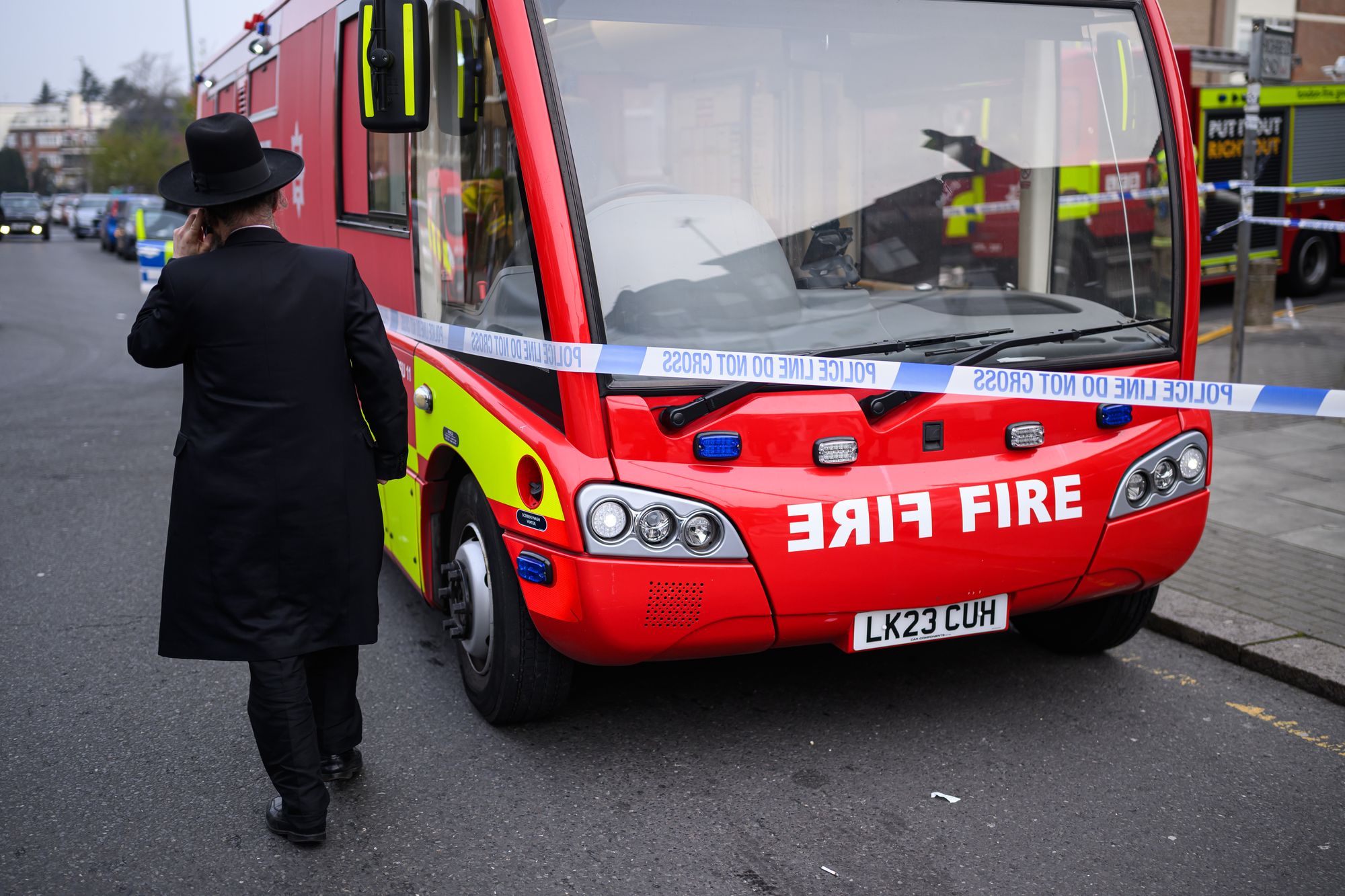 A man at the cordon after an antisemitic attack in north London