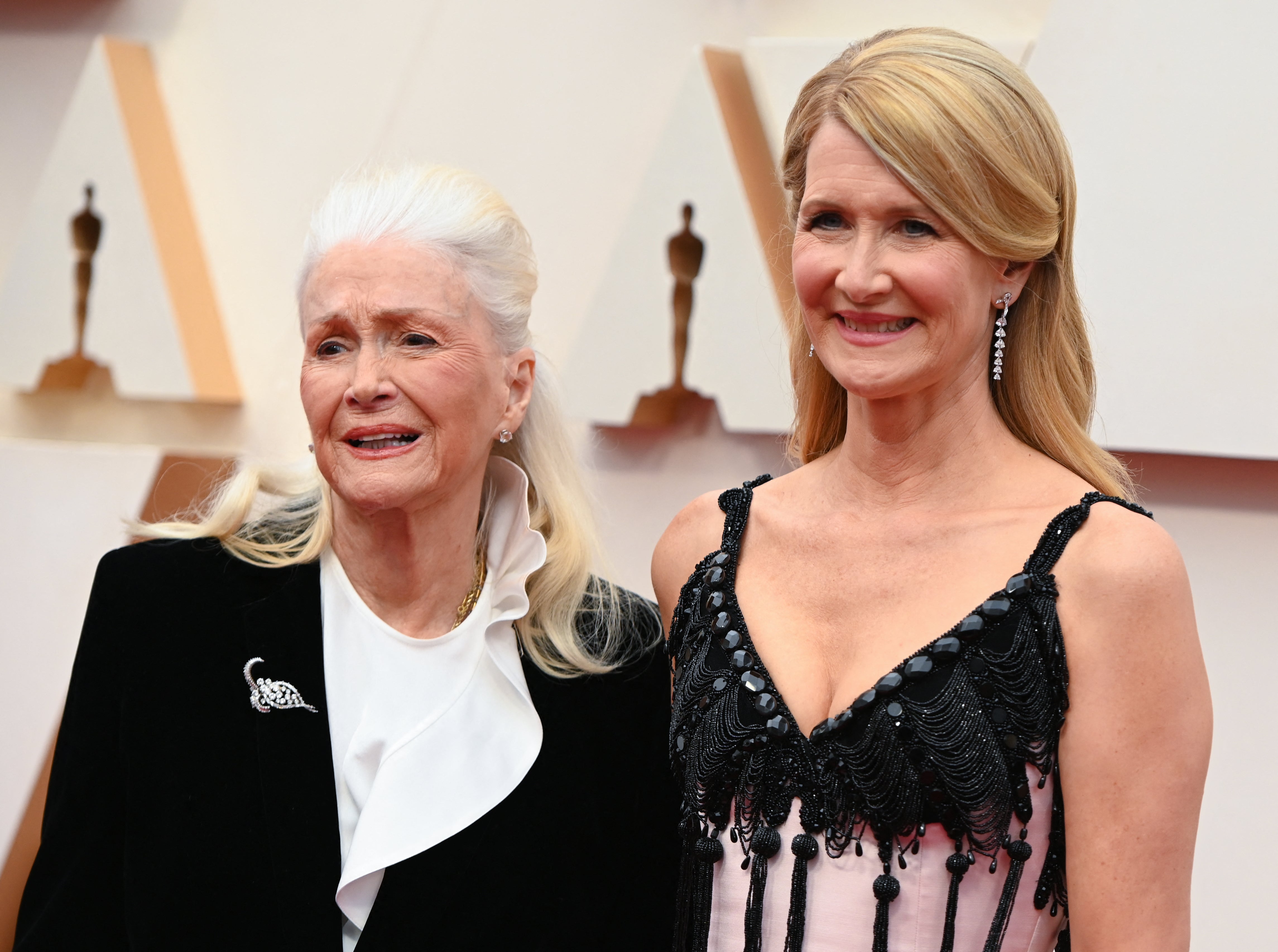 Actress Laura Dern, right, and her mother actress Diane Ladd are seen at the 2020 Academy Awards in Hollywood, California. After Ladd was diagnosed with idiopathic pulmonary fibrosis, Dern became her caregiver