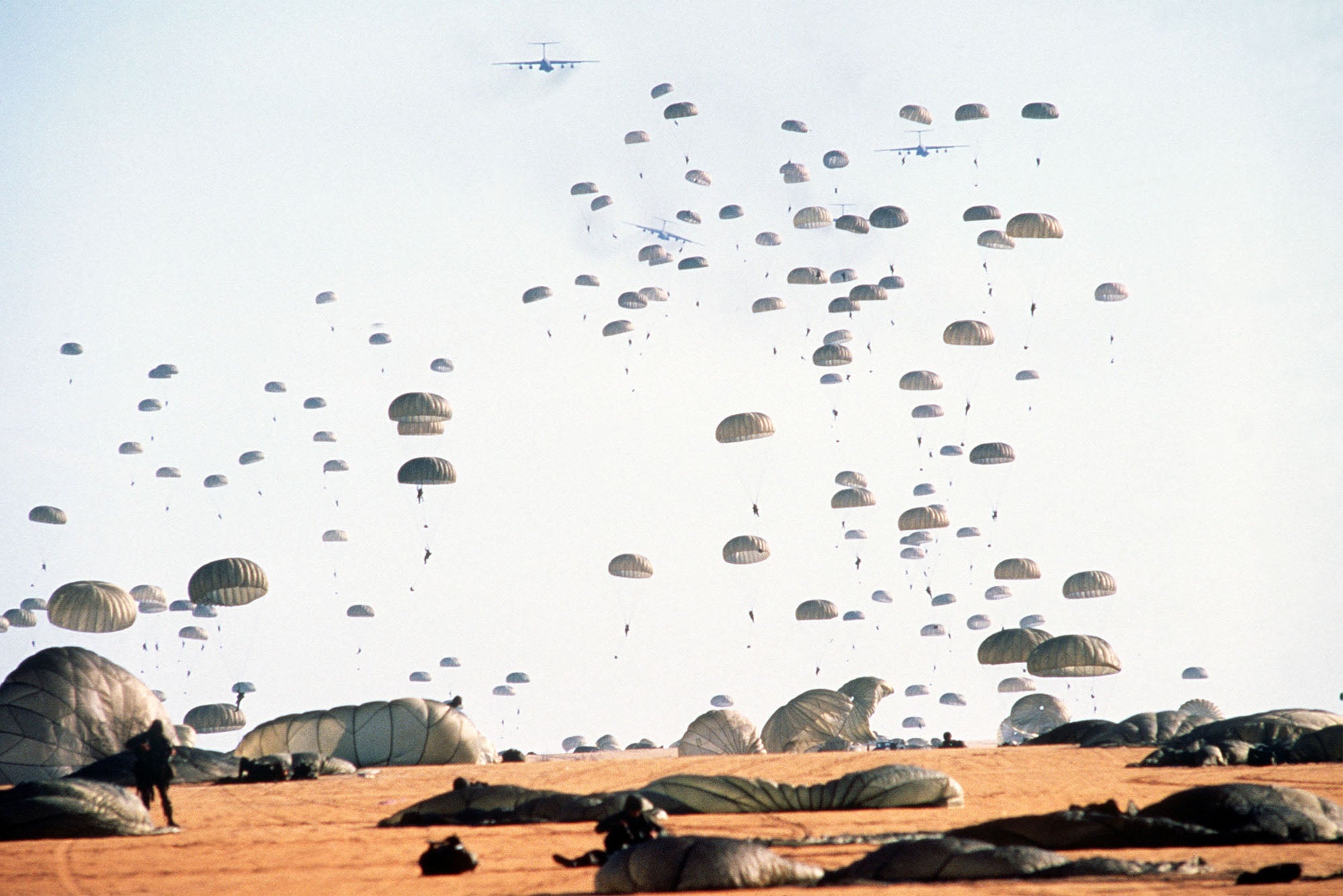 Members of the 82nd Airborne Division land after jumping from C-141B Starlifter aircraft (file photo)