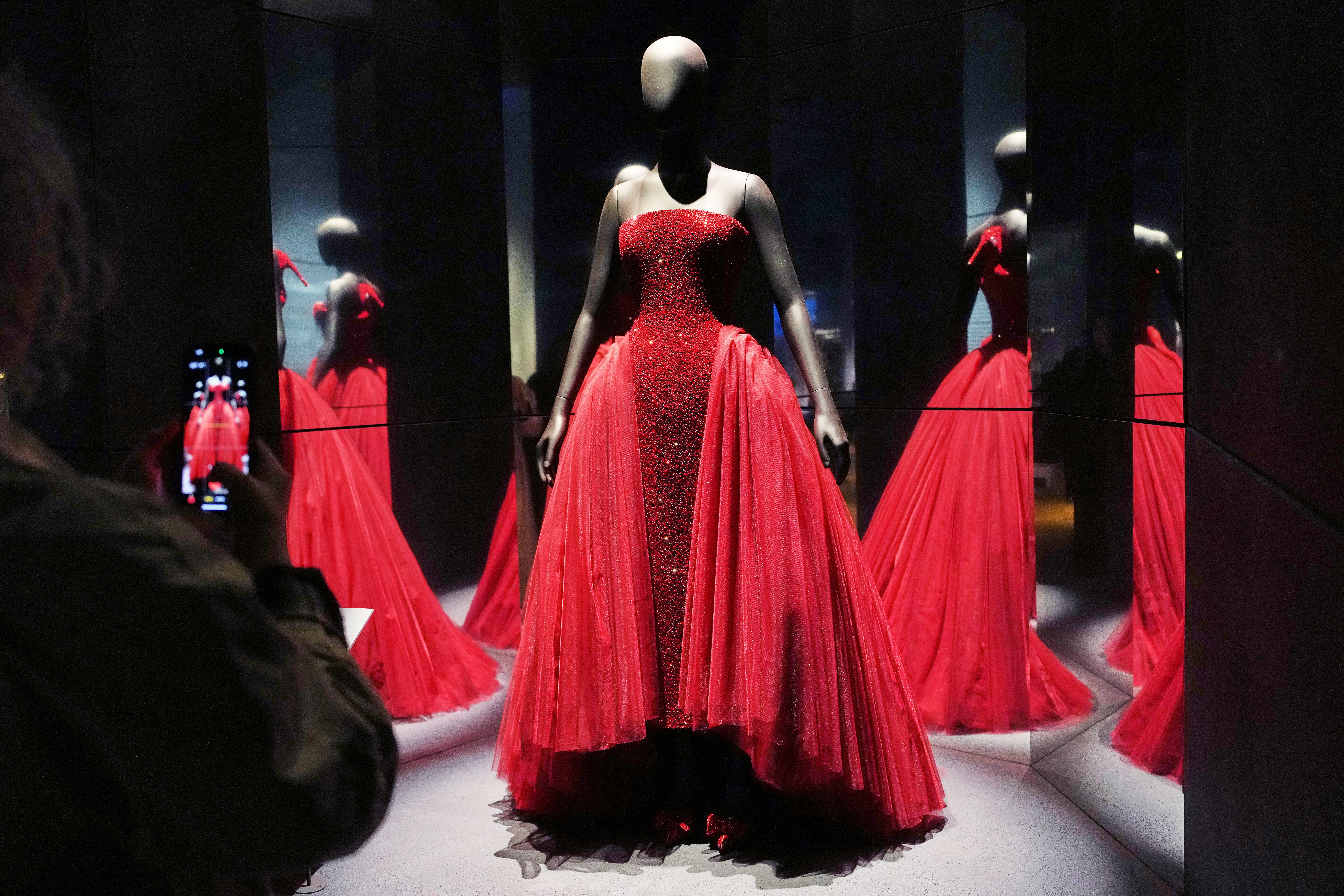 schiaparelli evening dress Framed Print of Schiaparelli Red Satin Evening Gown Print, Early 1950s. Framed Print from Mary Evans
