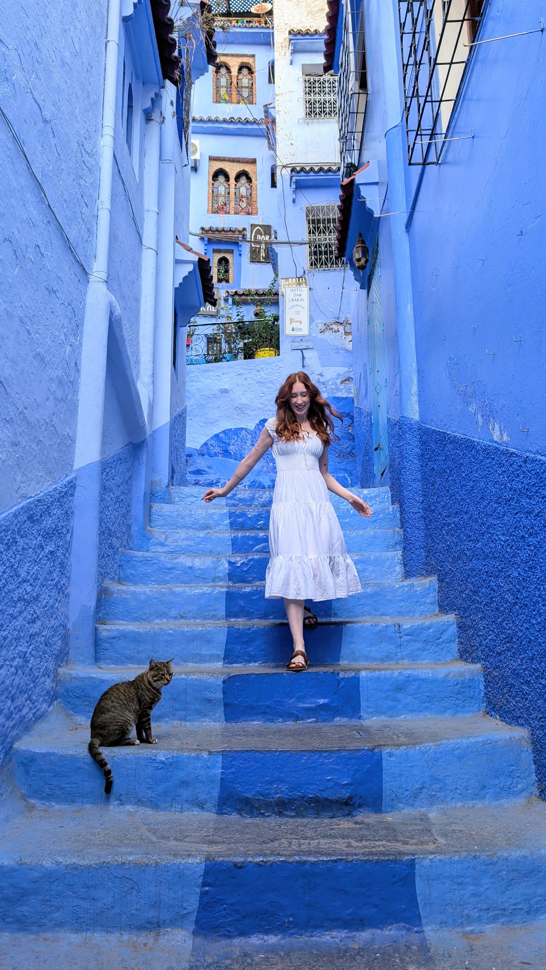 Olivia in the vibrant blue city of Chefchaouen