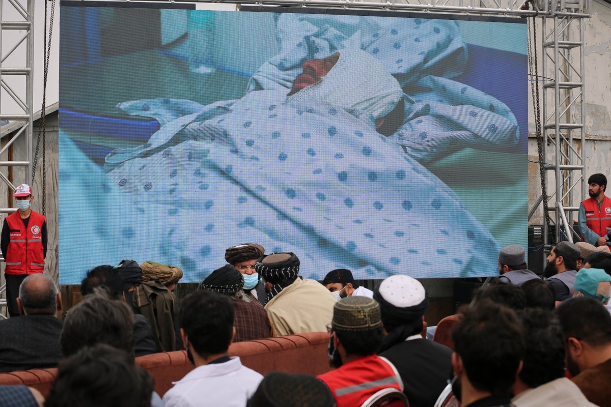Afghans hold second mass funeral for victims of an airstrike that hit a Kabul drug treatment center