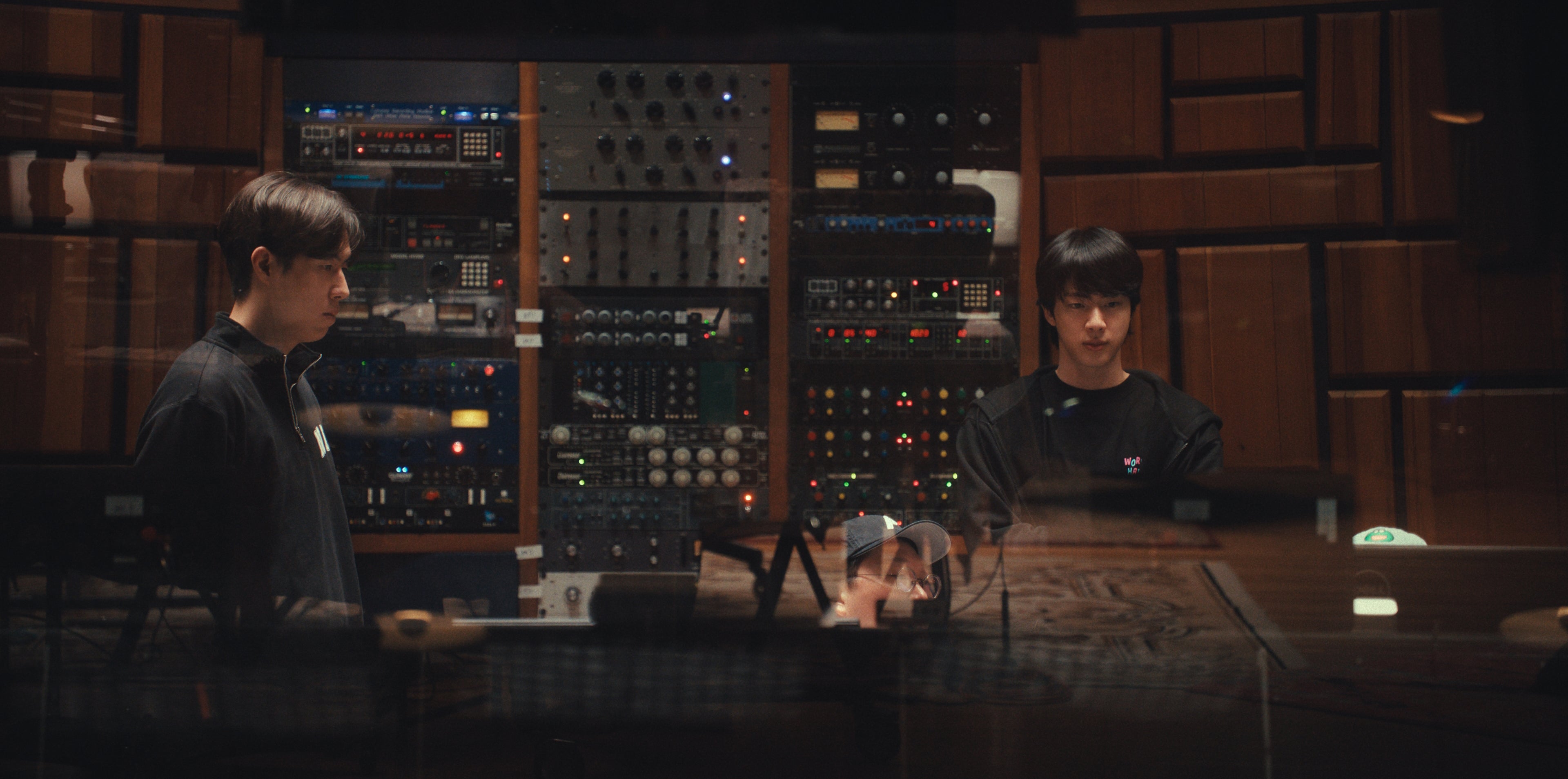 Jin (right) joins the rest of BTS in Los Angeles a day after his tour ended