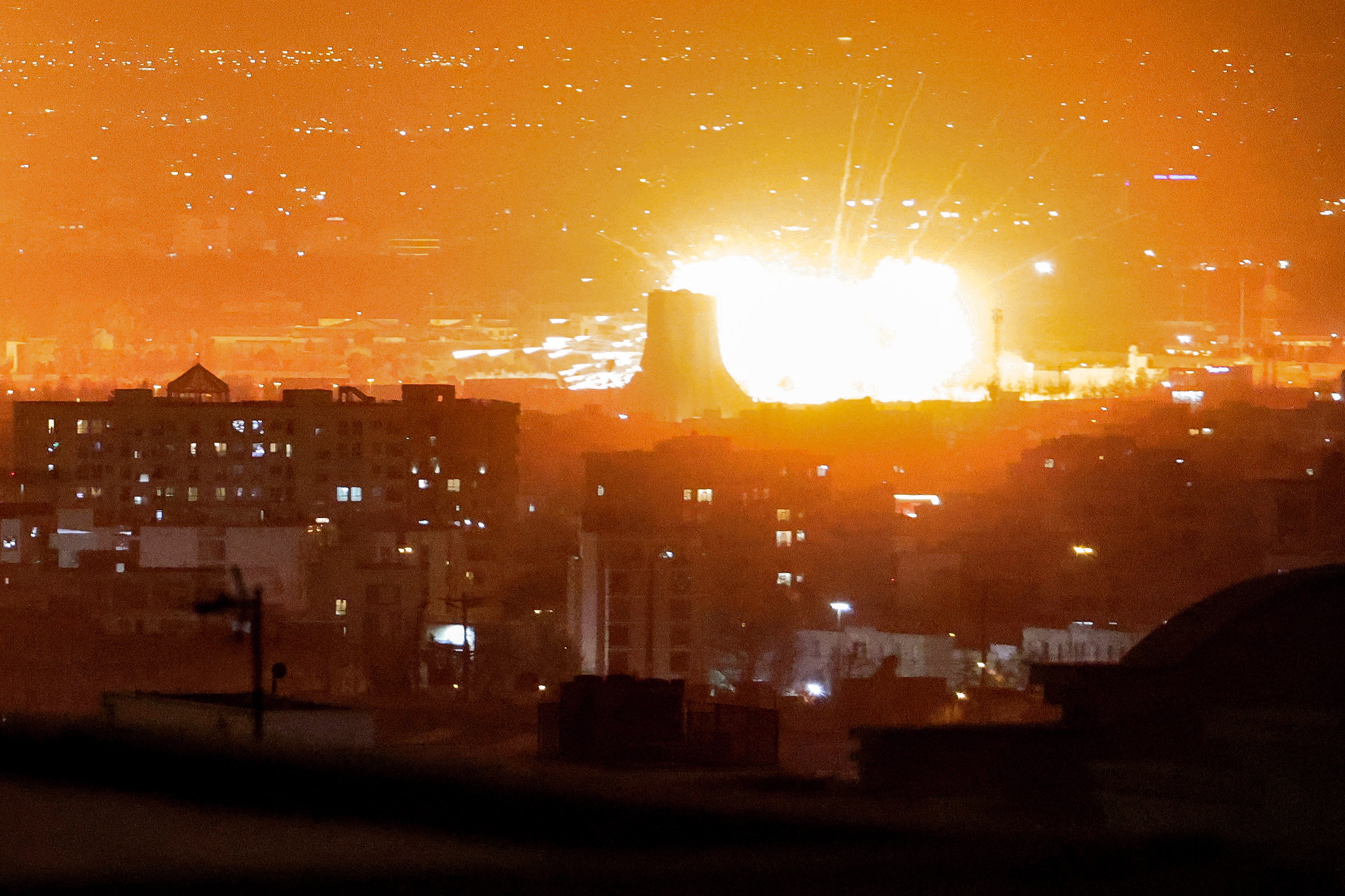 An explosion erupts following strikes near Azadi Tower close to Mehrabad International Airport in Tehran on March 7