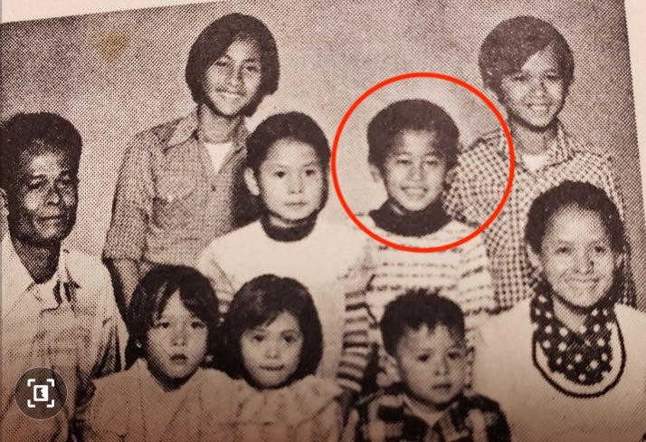 Lothirath, circled, pictured with his parents and six siblings. They were among the second wave of refugees from South East Asia to arrive in the U.S. after fleeing the violent communist dictatorship of Laos