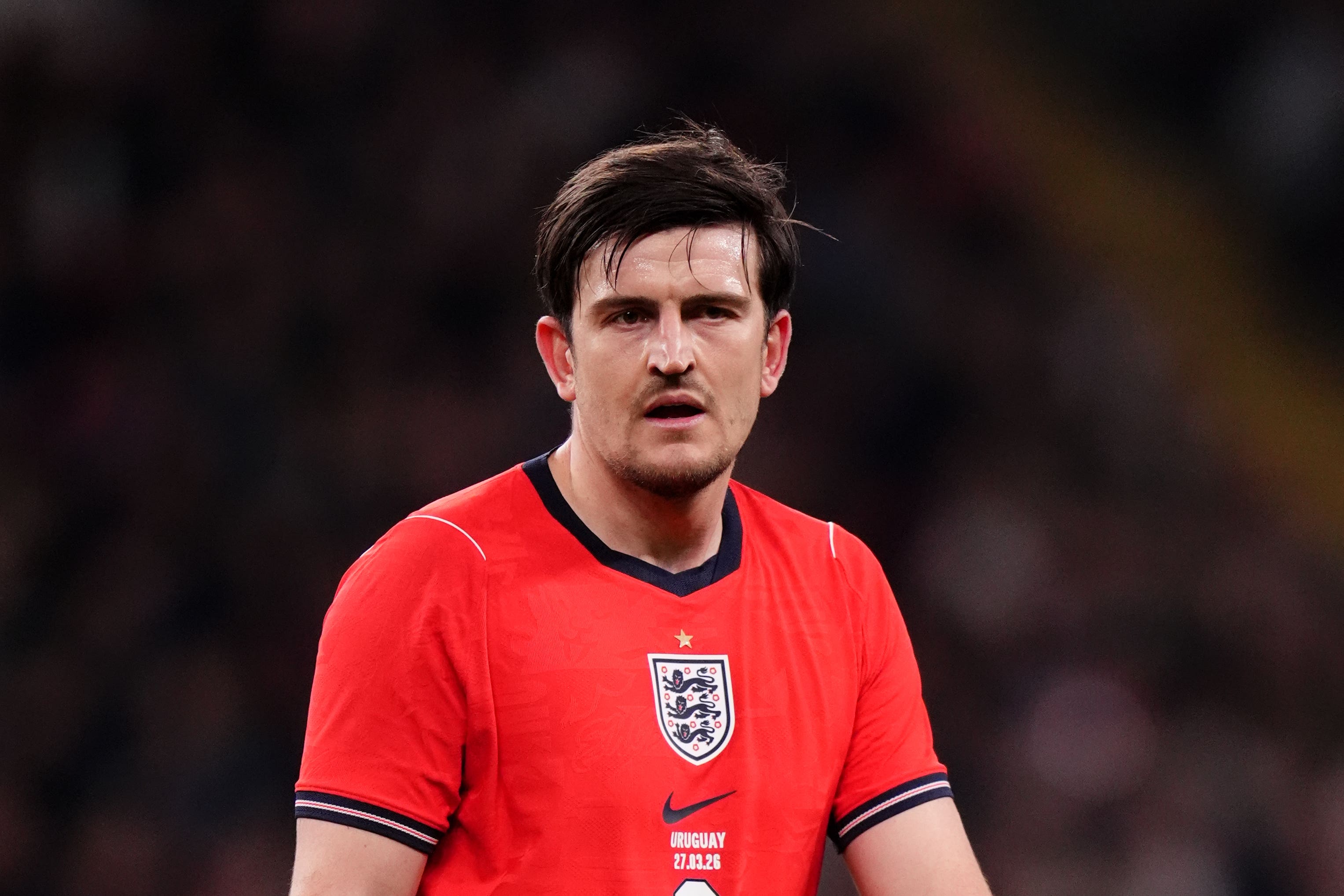 Harry Maguire made his first England appearance under Thomas Tuchel on Friday (John Walton/PA)