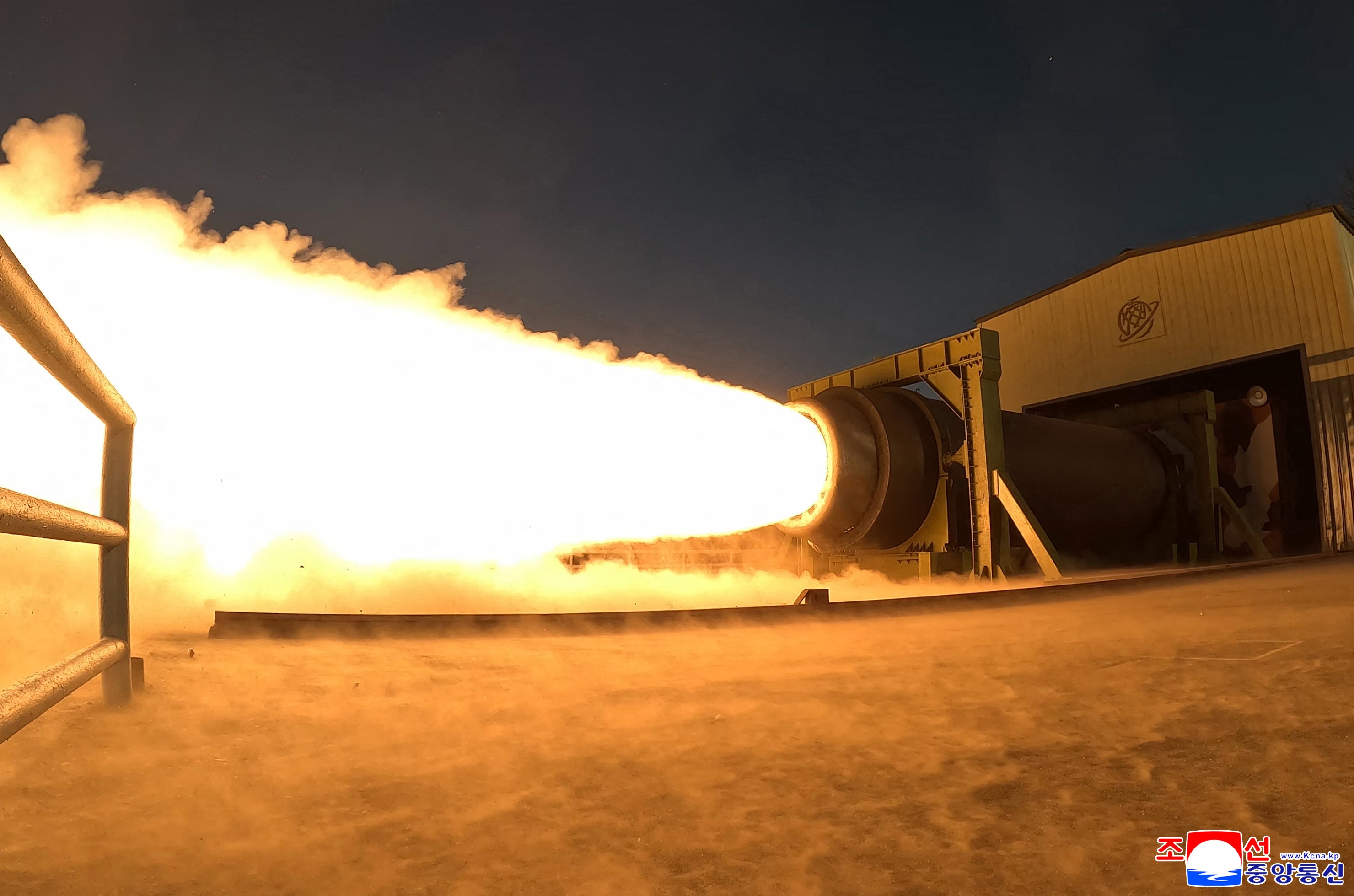This undated picture released by North Korea's official Korean Central News Agency (KCNA) on 29 March 2026 shows a combustion test of a solid-fuel rocket engine at an undisclosed location in North Korea